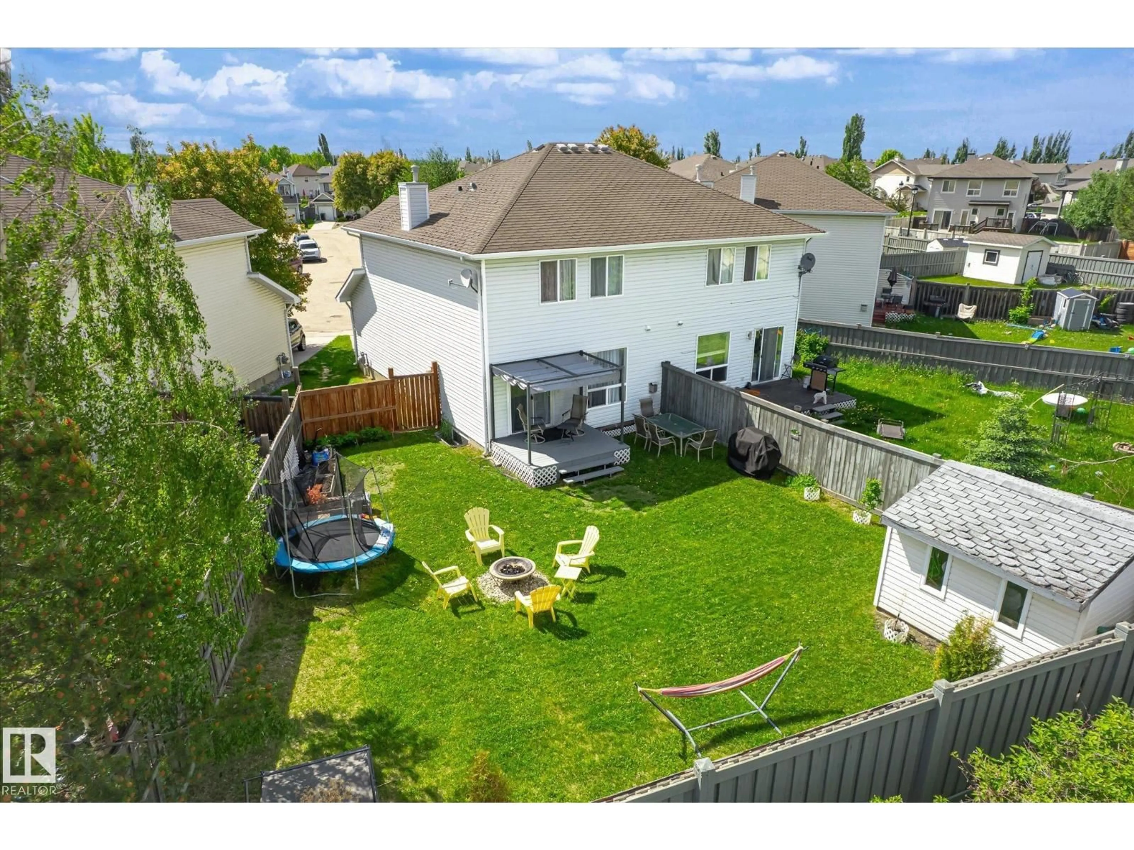 A pic from outside/outdoor area/front of a property/back of a property/a pic from drone, street for NW - 20004 54A AV, Edmonton Alberta T6M2W4