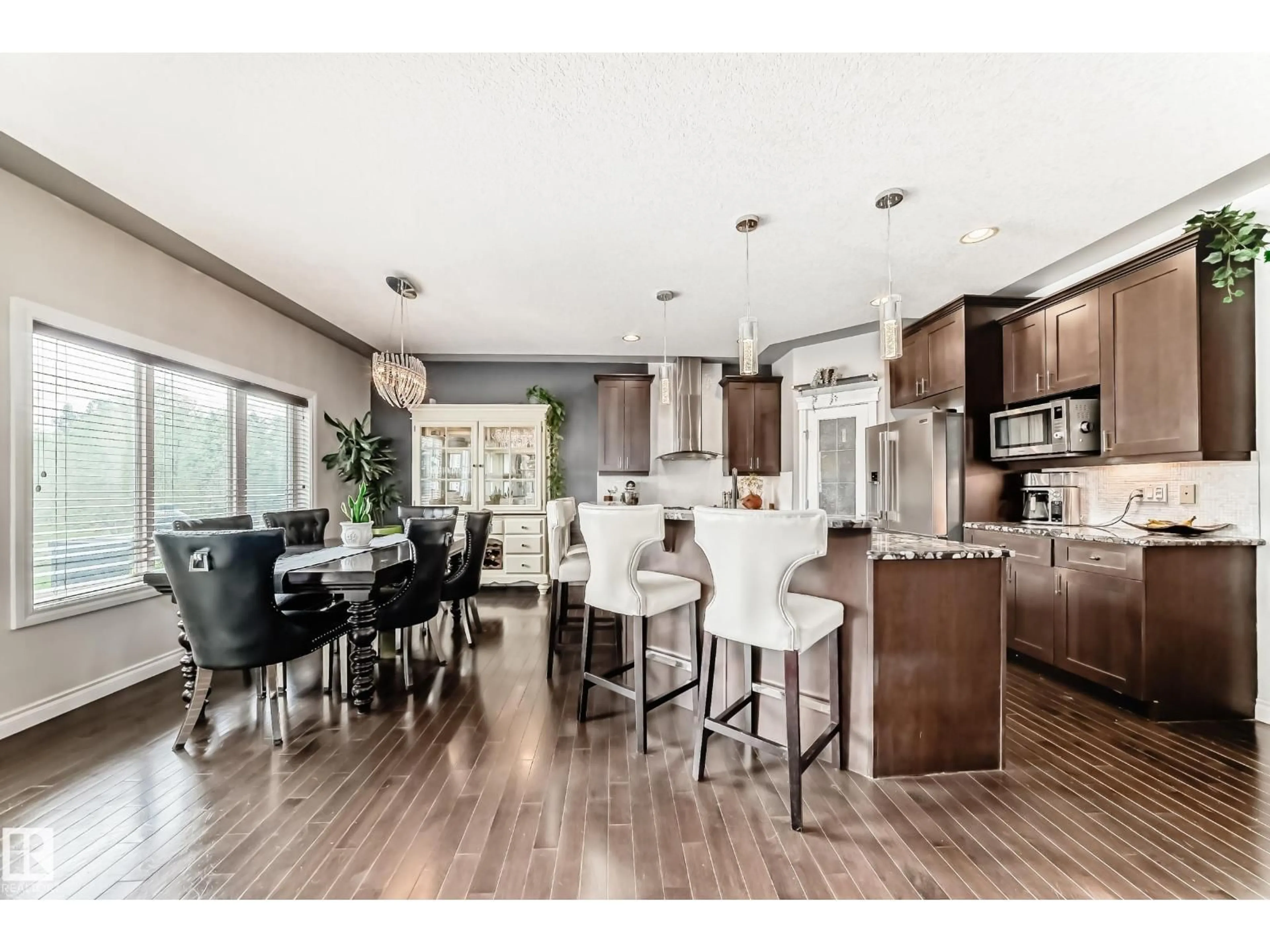 Open concept kitchen, wood/laminate floor for 59 53305 RGE ROAD 273, Rural Parkland County Alberta T7X3K2