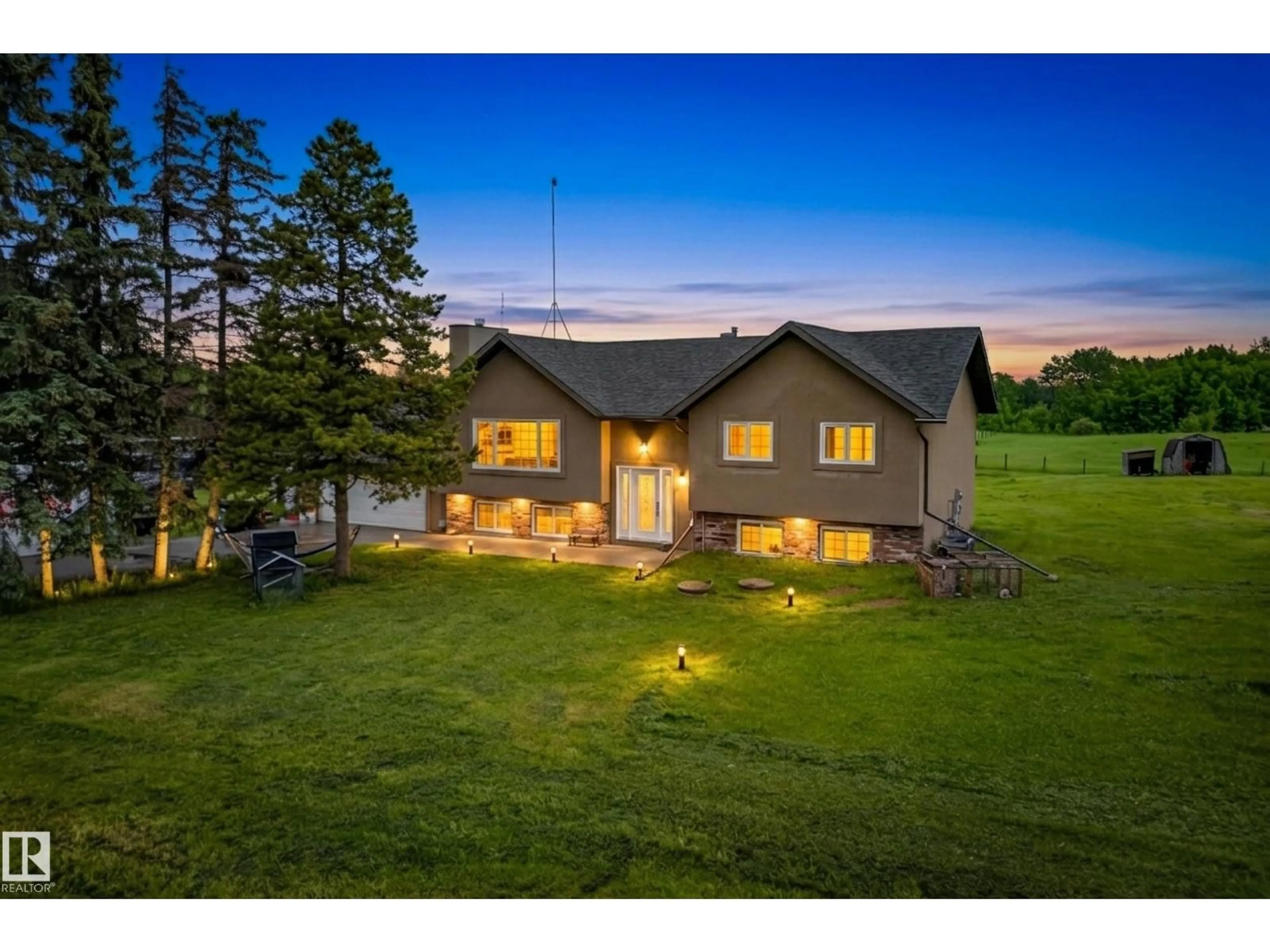 A pic from outside/outdoor area/front of a property/back of a property/a pic from drone, unknown for 51561 - 217 RGE ROAD 224, Rural Strathcona County Alberta T8C1H5