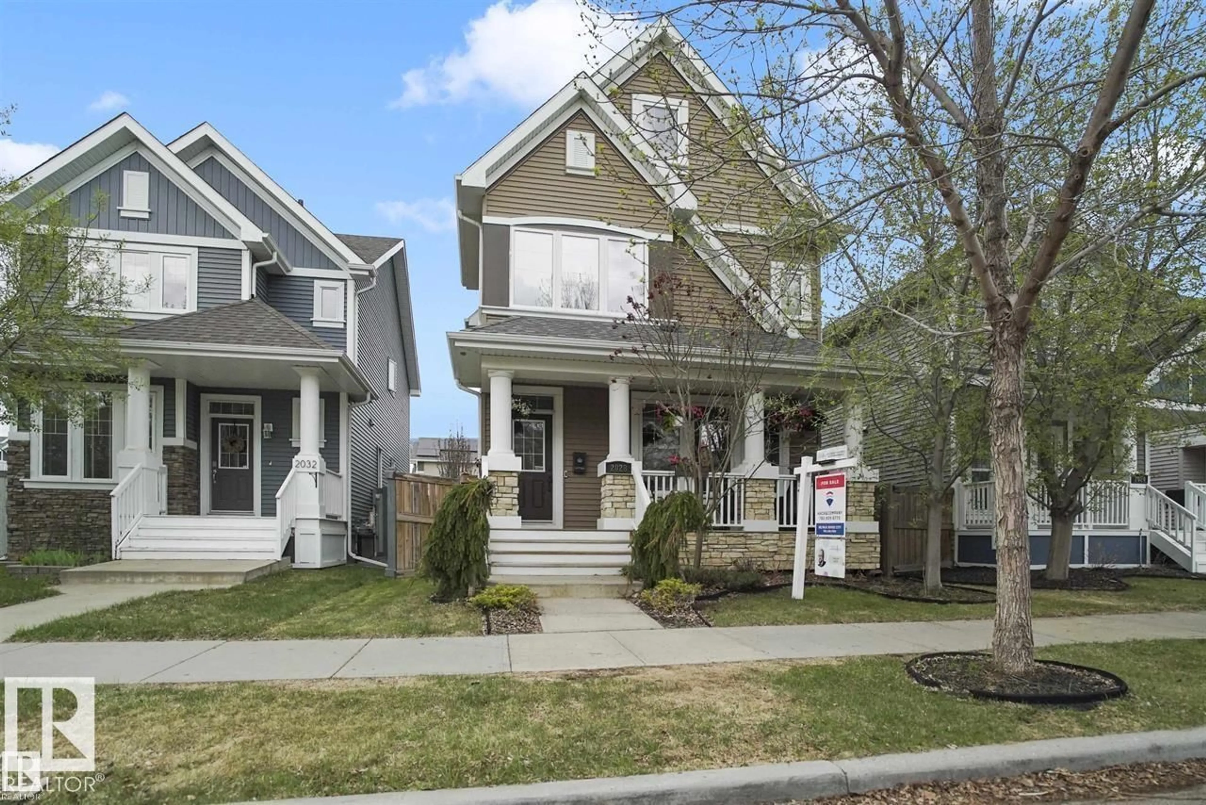 Home with vinyl exterior material, street for 2028 74 ST, Edmonton Alberta T6X0V7
