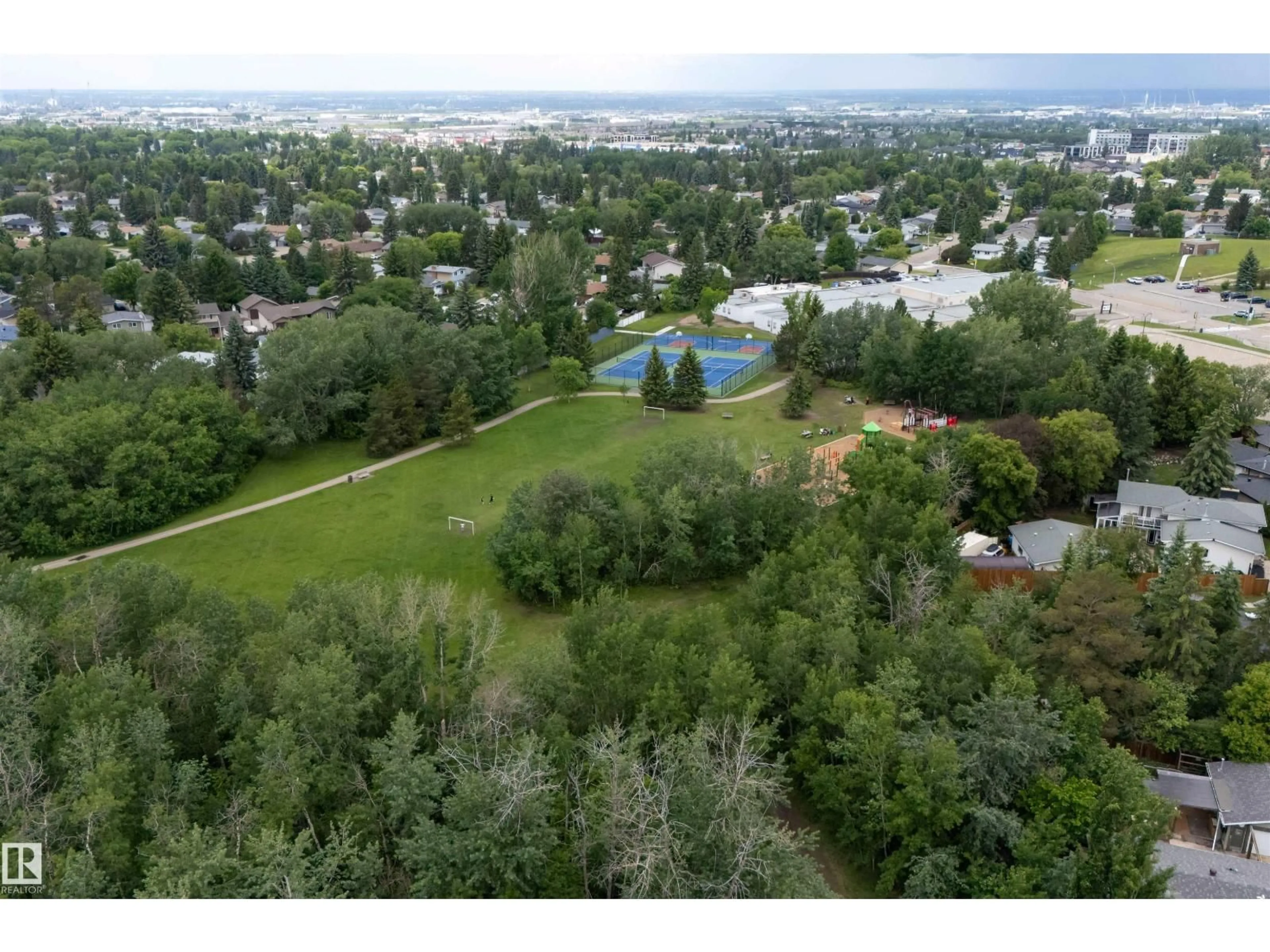 A pic from outside/outdoor area/front of a property/back of a property/a pic from drone, water/lake/river/ocean view for 140 GREENGOVE AVE, Sherwood Park Alberta T8A3C7