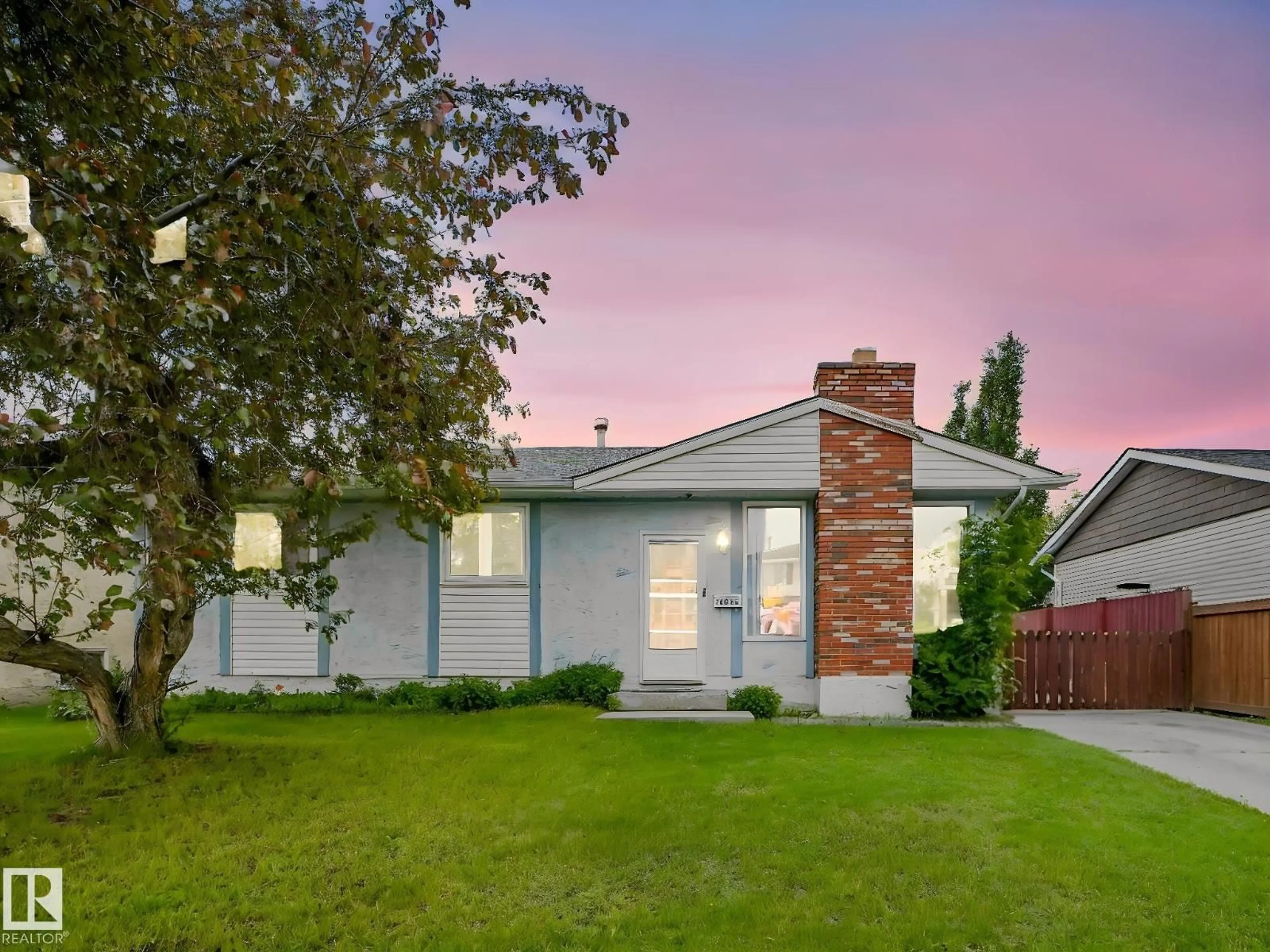 Home with vinyl exterior material, street for 16215 114 ST, Edmonton Alberta T5X2L9