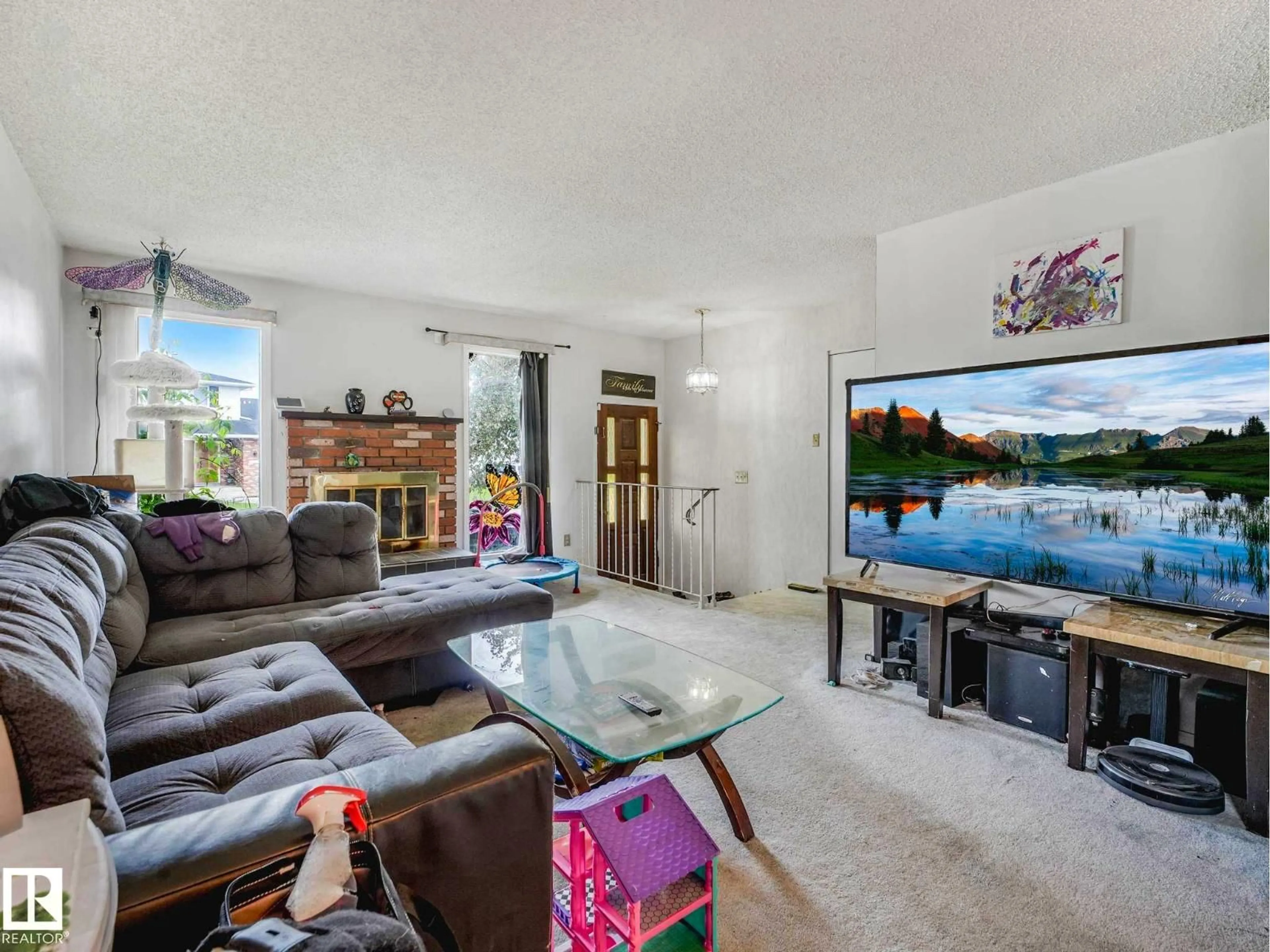 Living room with furniture, unknown for 16215 114 ST, Edmonton Alberta T5X2L9