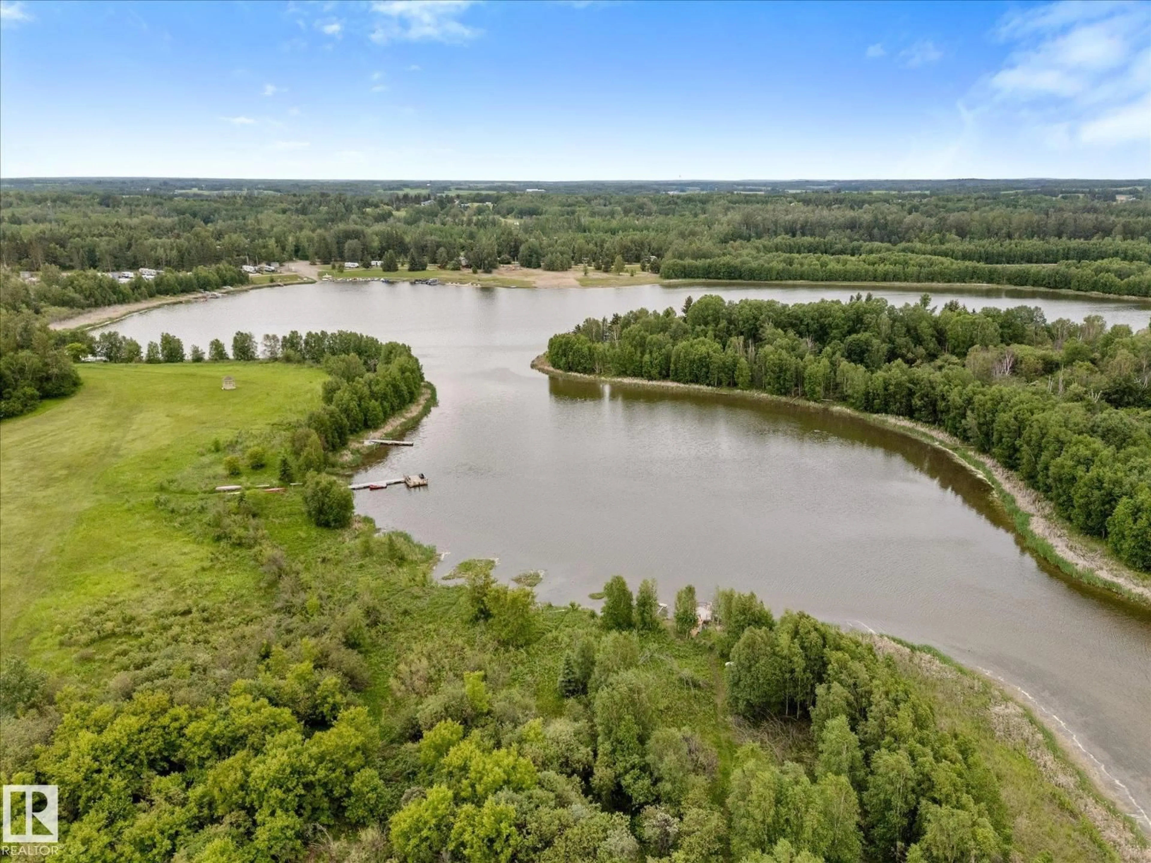 A pic from outside/outdoor area/front of a property/back of a property/a pic from drone, water/lake/river/ocean view for 819 HERMITAGE DR, Rural Parkland County Alberta T7Z2T3