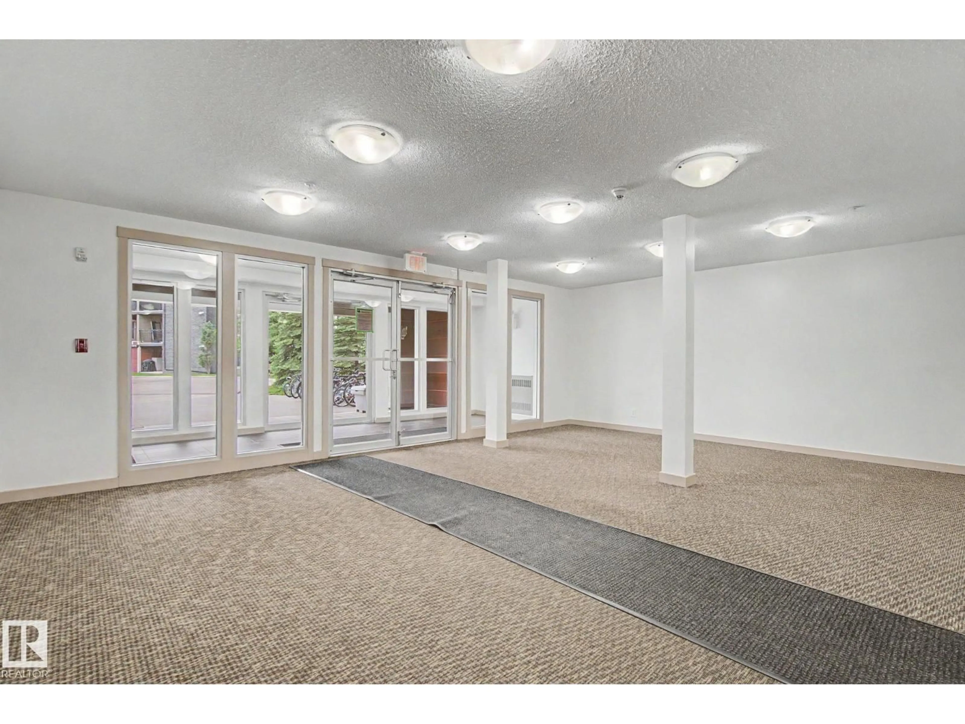 Indoor foyer for #224 - 3315 JAMES MOWATT TR, Edmonton Alberta T6W3L9