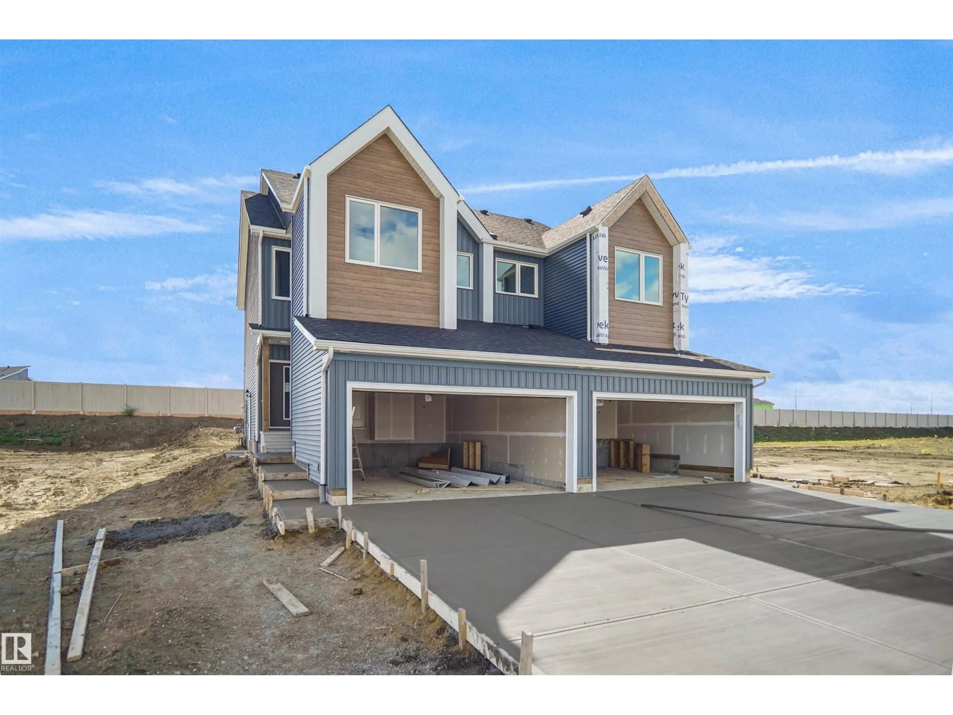 Home with vinyl exterior material, street for 1433 9 ST, Edmonton Alberta T6T2N8