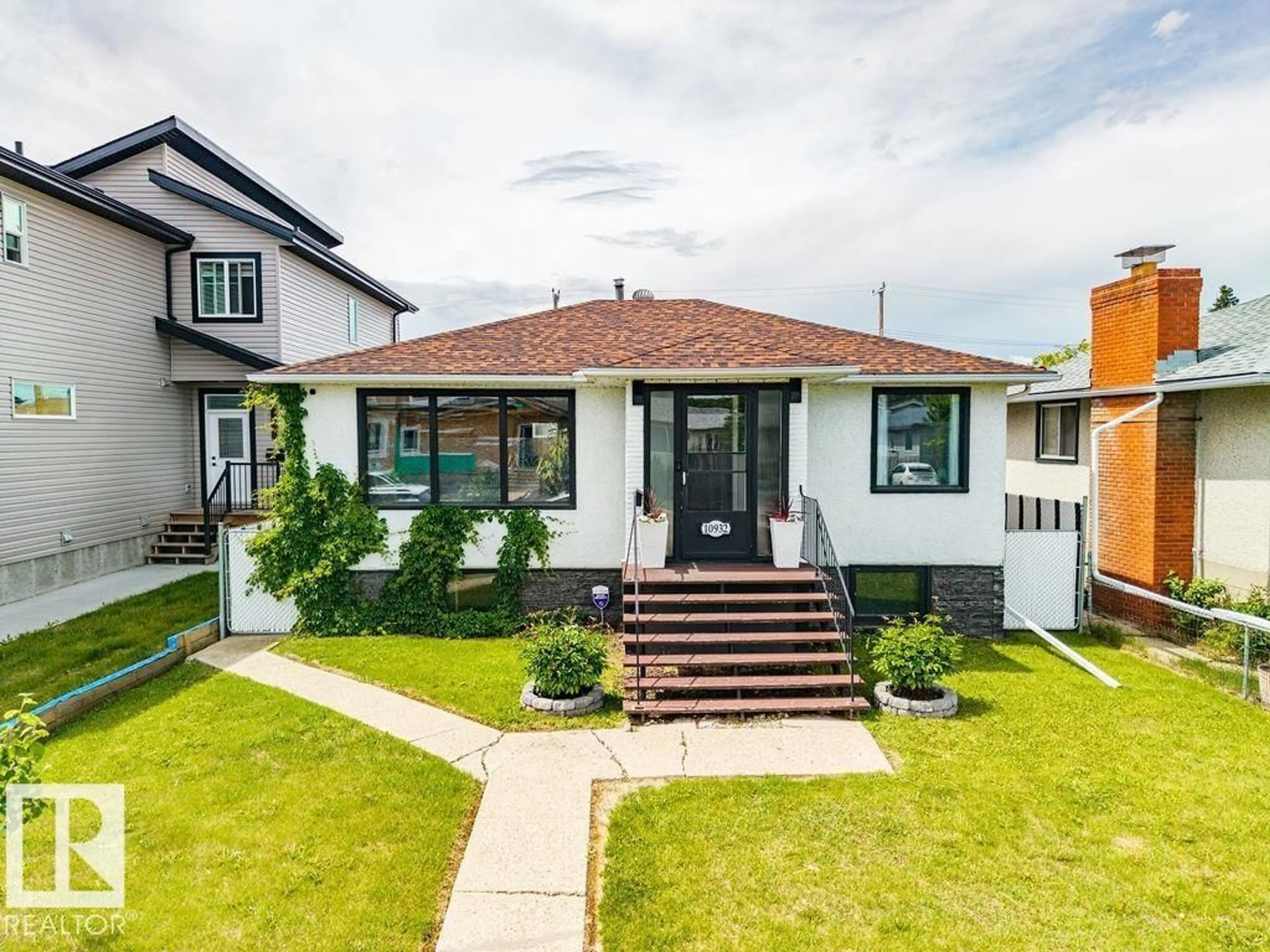 Home with brick exterior material, street for NW - 10932 151 ST, Edmonton Alberta T5P1W1