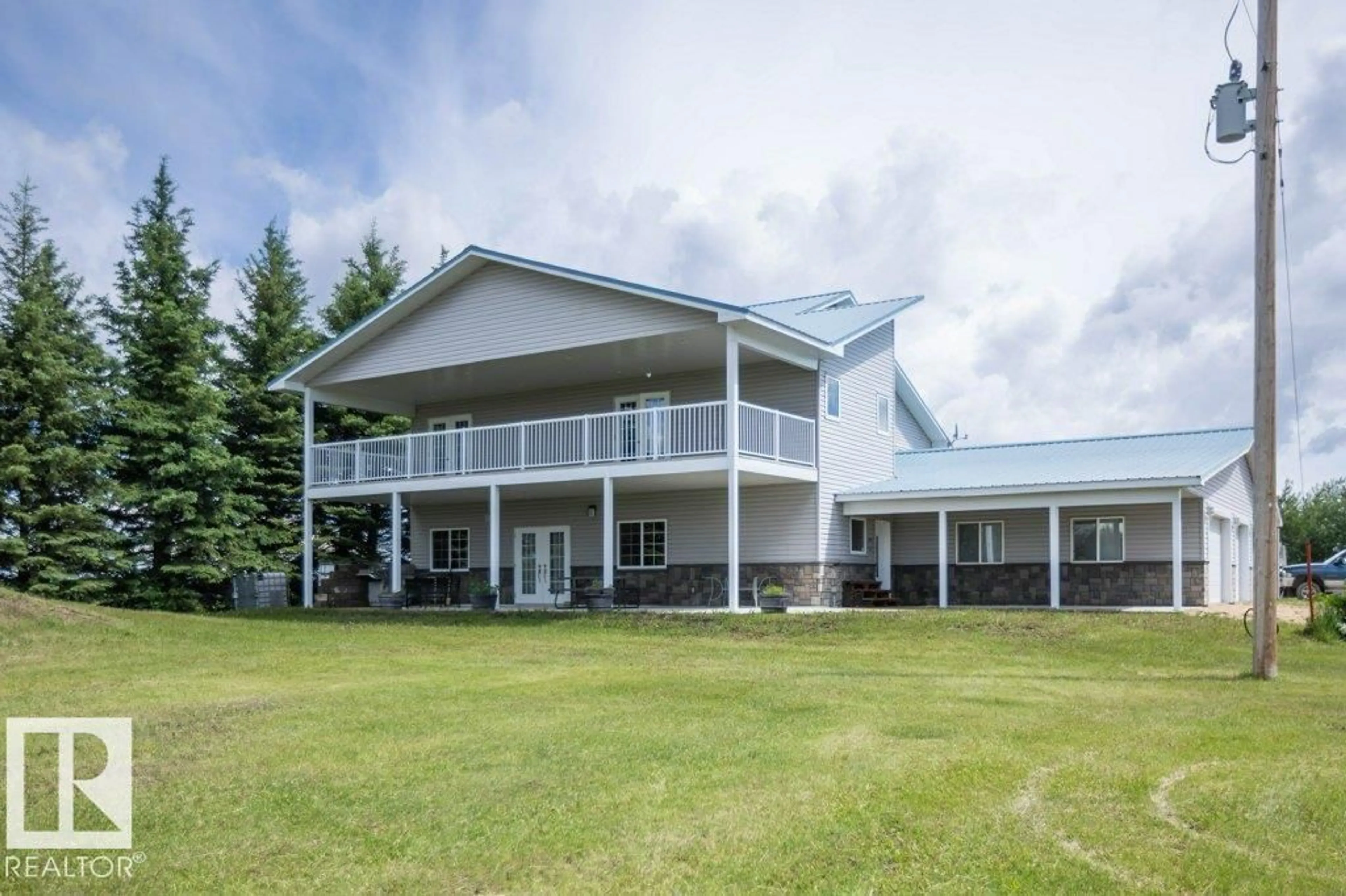 A pic from outside/outdoor area/front of a property/back of a property/a pic from drone, unknown for 58505 RNG RD 260, Rural Westlock County Alberta T0G2J0
