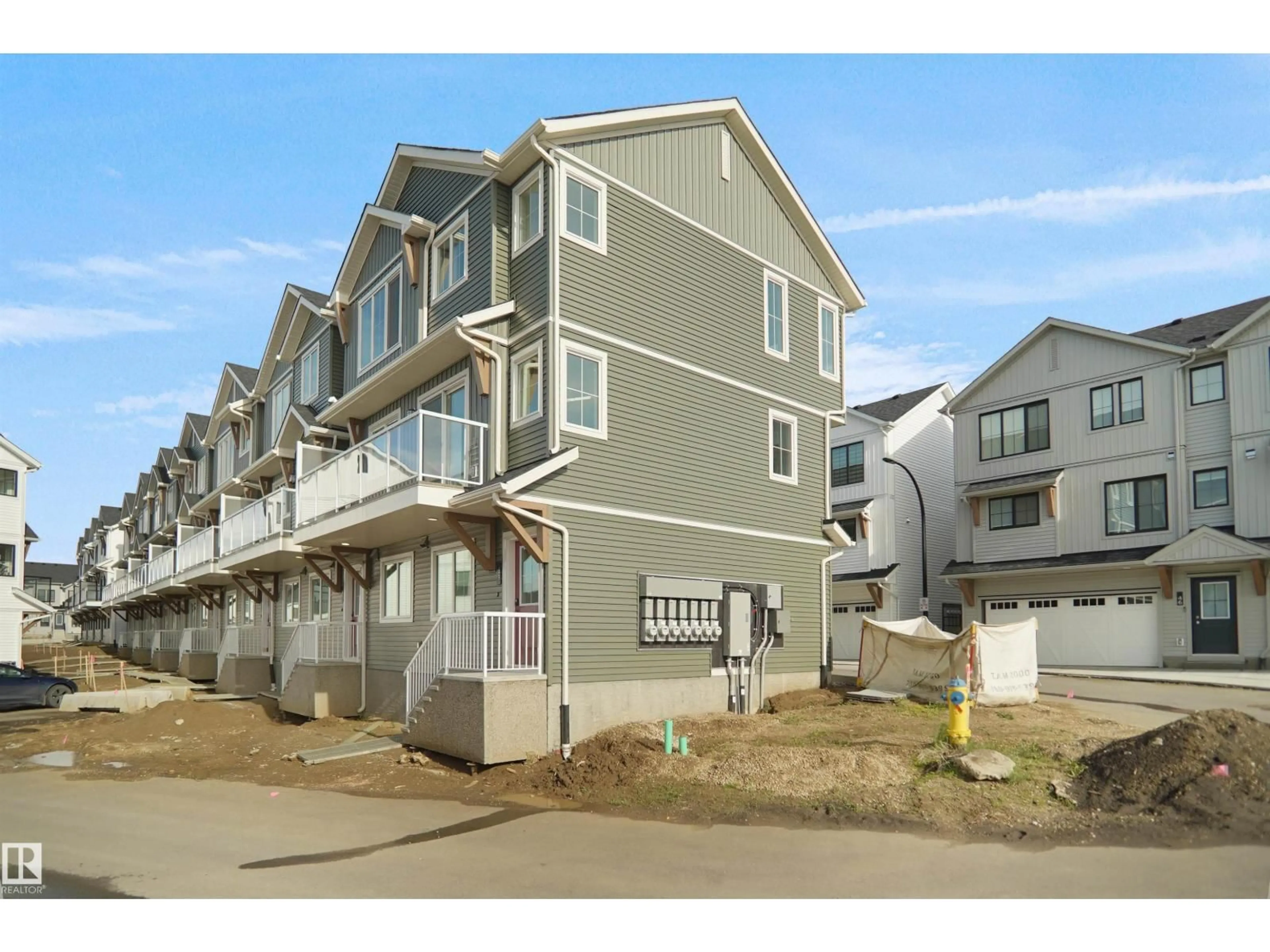 Home with vinyl exterior material, street for 65 SECORD BV, Edmonton Alberta T5T7V3