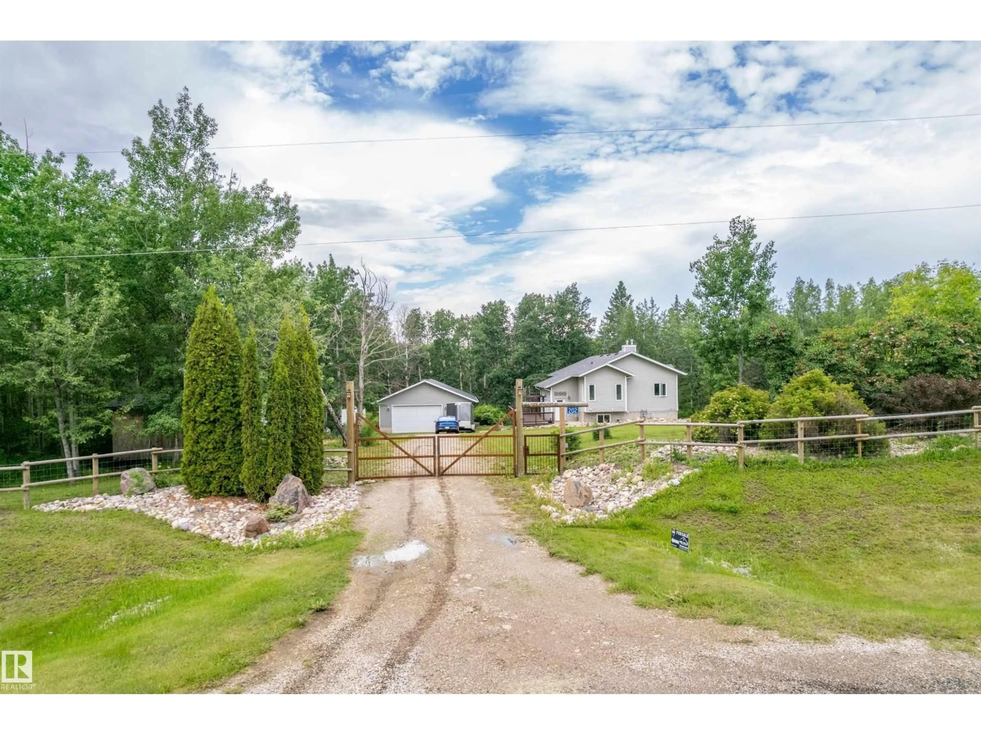 A pic from outside/outdoor area/front of a property/back of a property/a pic from drone, unknown for 202 - 55109 HWY 777, Rural Lac Ste. Anne County Alberta T0E1V0