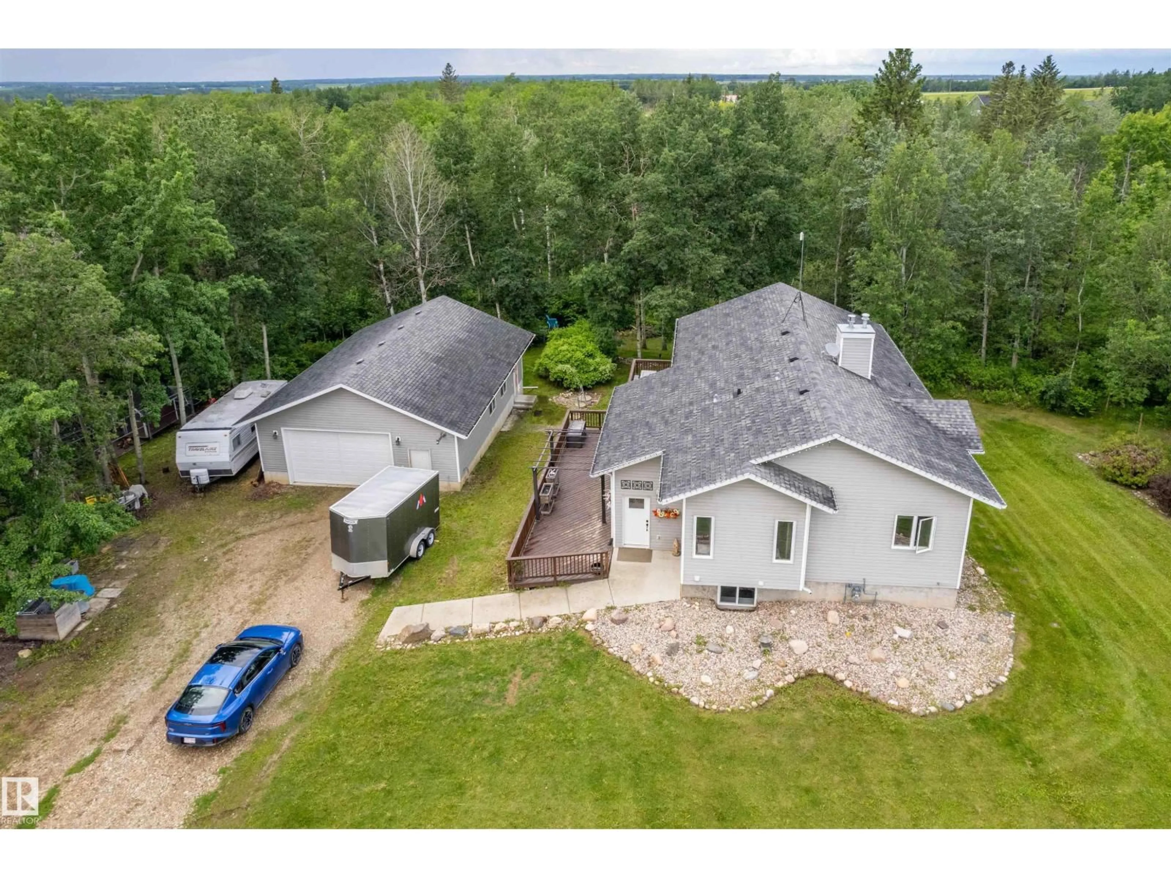 A pic from outside/outdoor area/front of a property/back of a property/a pic from drone, unknown for 202 - 55109 HWY 777, Rural Lac Ste. Anne County Alberta T0E1V0