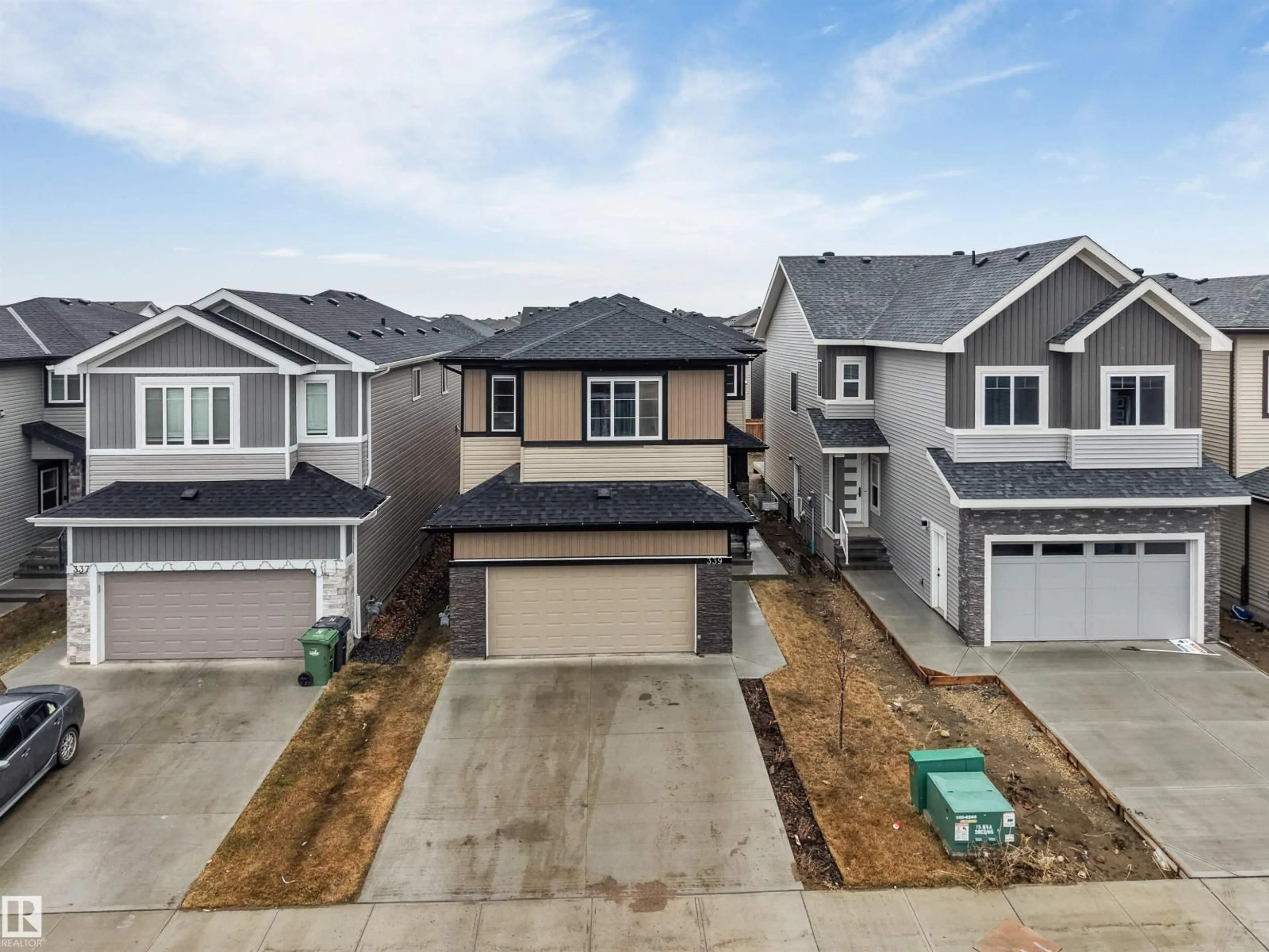 A pic from outside/outdoor area/front of a property/back of a property/a pic from drone, street for 339 ROBERTS WD, Leduc Alberta T9E1P8