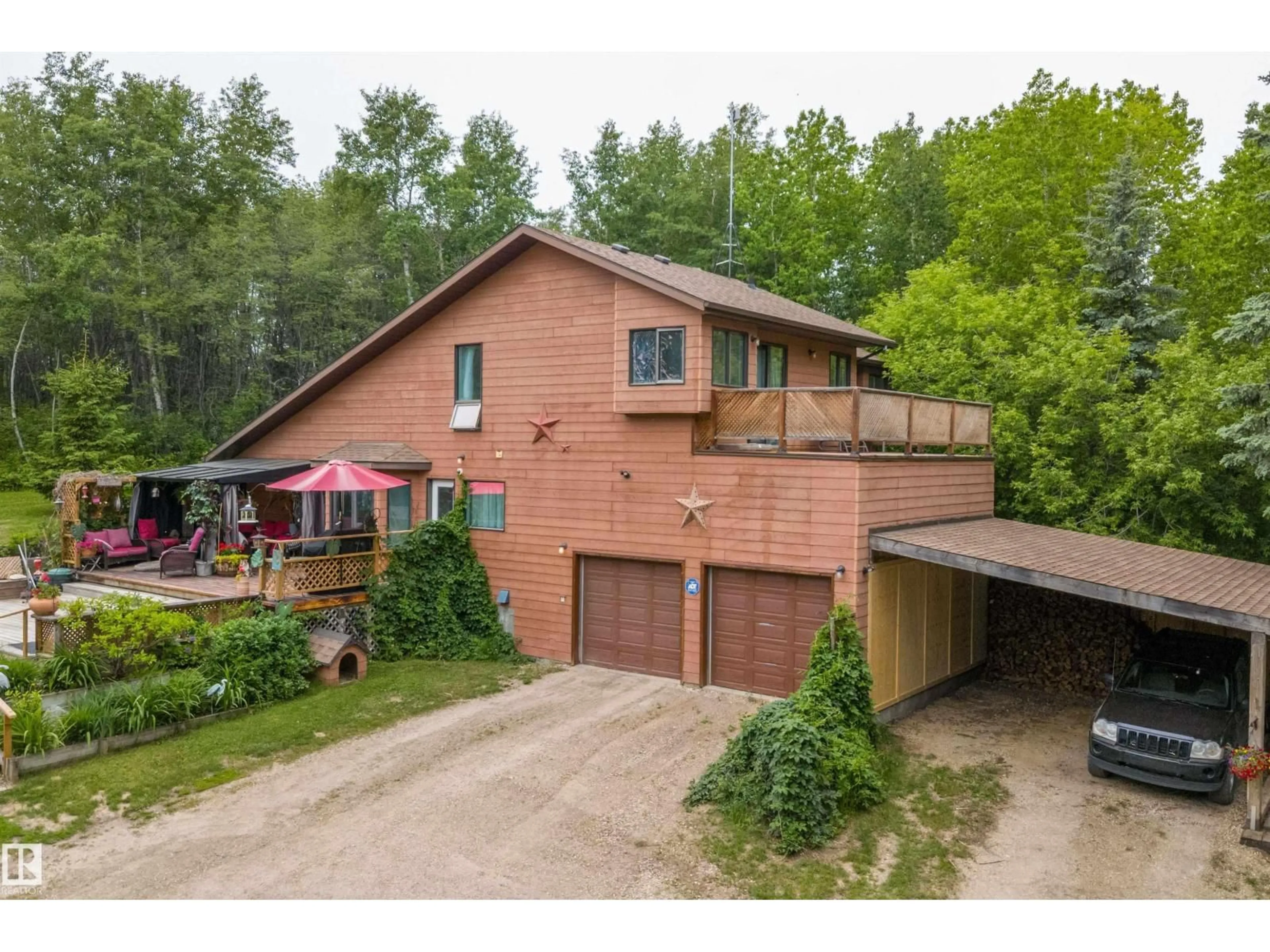 A pic from outside/outdoor area/front of a property/back of a property/a pic from drone, unknown for 7 - 53424 RANGE ROAD 13, Rural Parkland County Alberta T7Y0B4