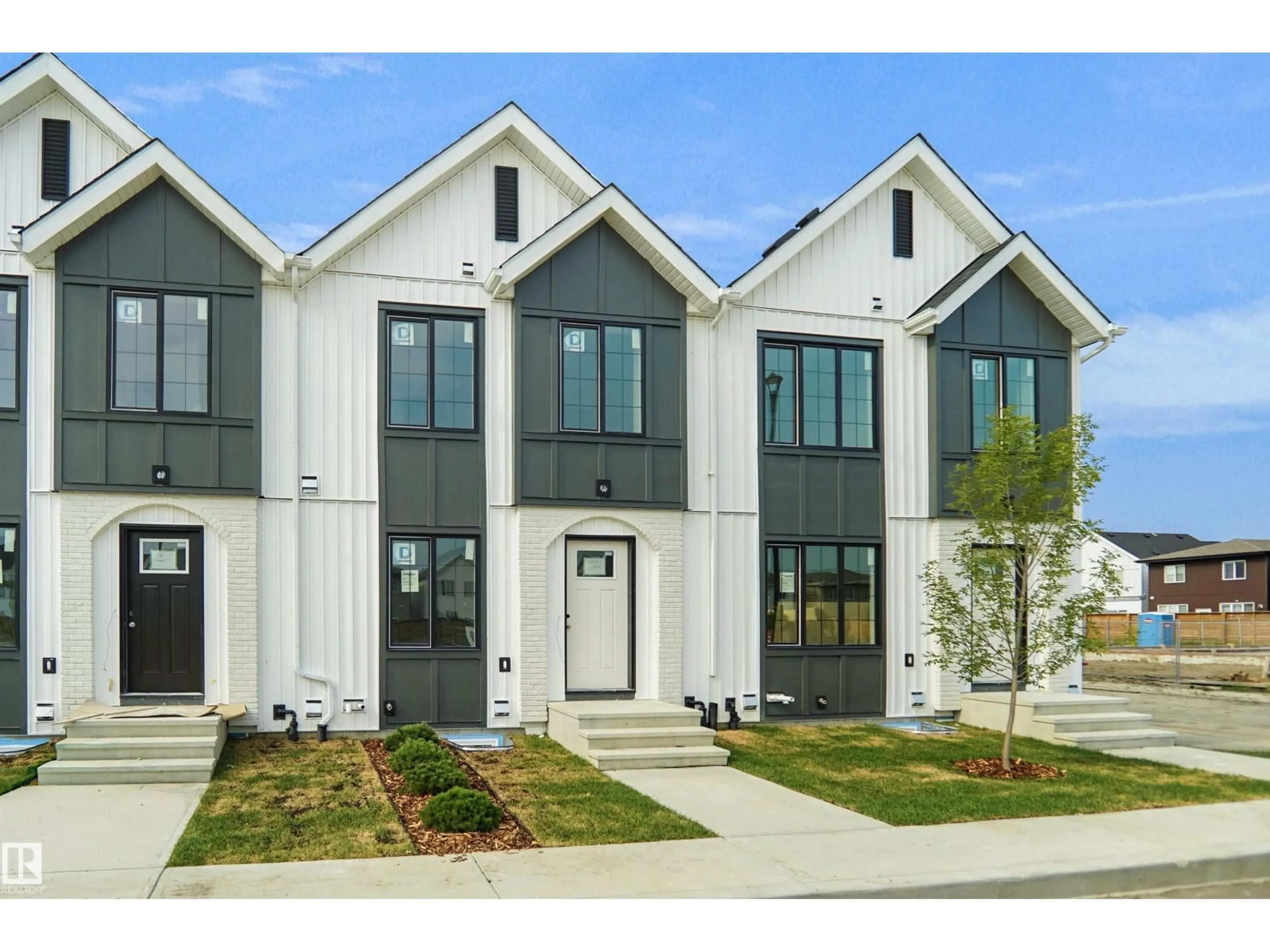 Home with vinyl exterior material, street for NE - 25 17319 ST, Edmonton Alberta T5Y4L5