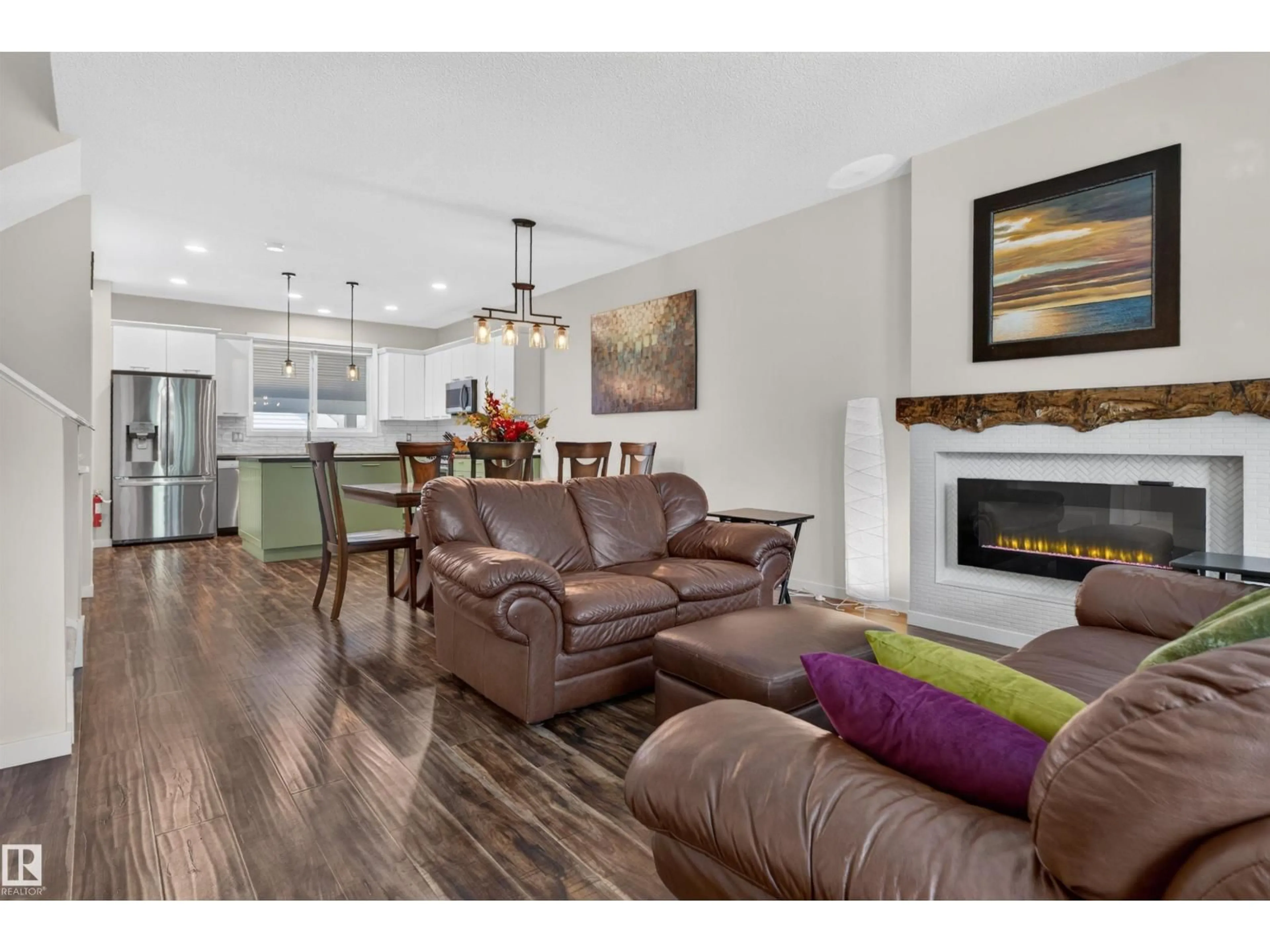 Open concept kitchen, wood/laminate floor for SW - 6928 22 AV, Edmonton Alberta T6X0V4