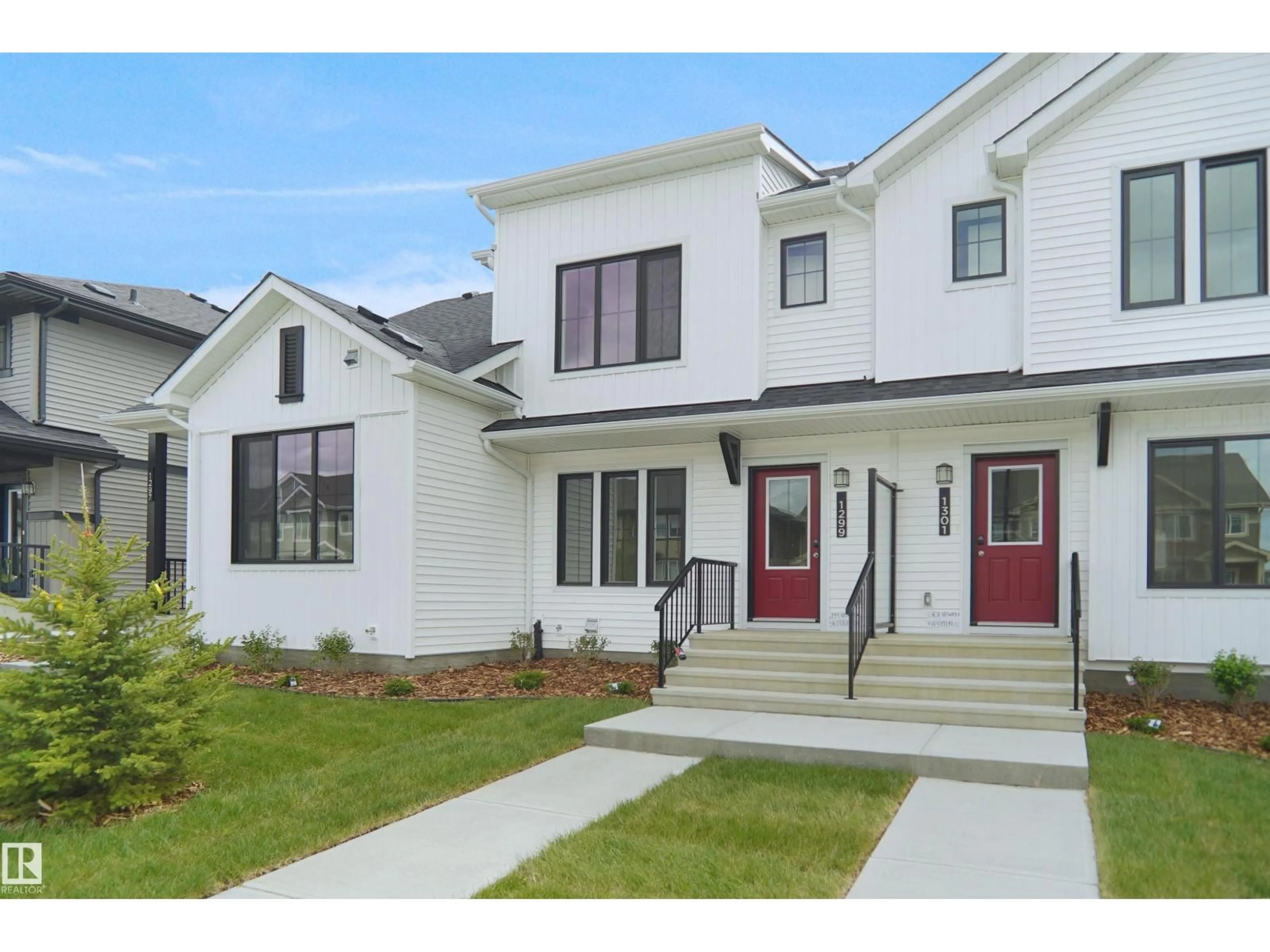 Home with vinyl exterior material, street for SW - 1301 KESWICK DR, Edmonton Alberta T6W5P1