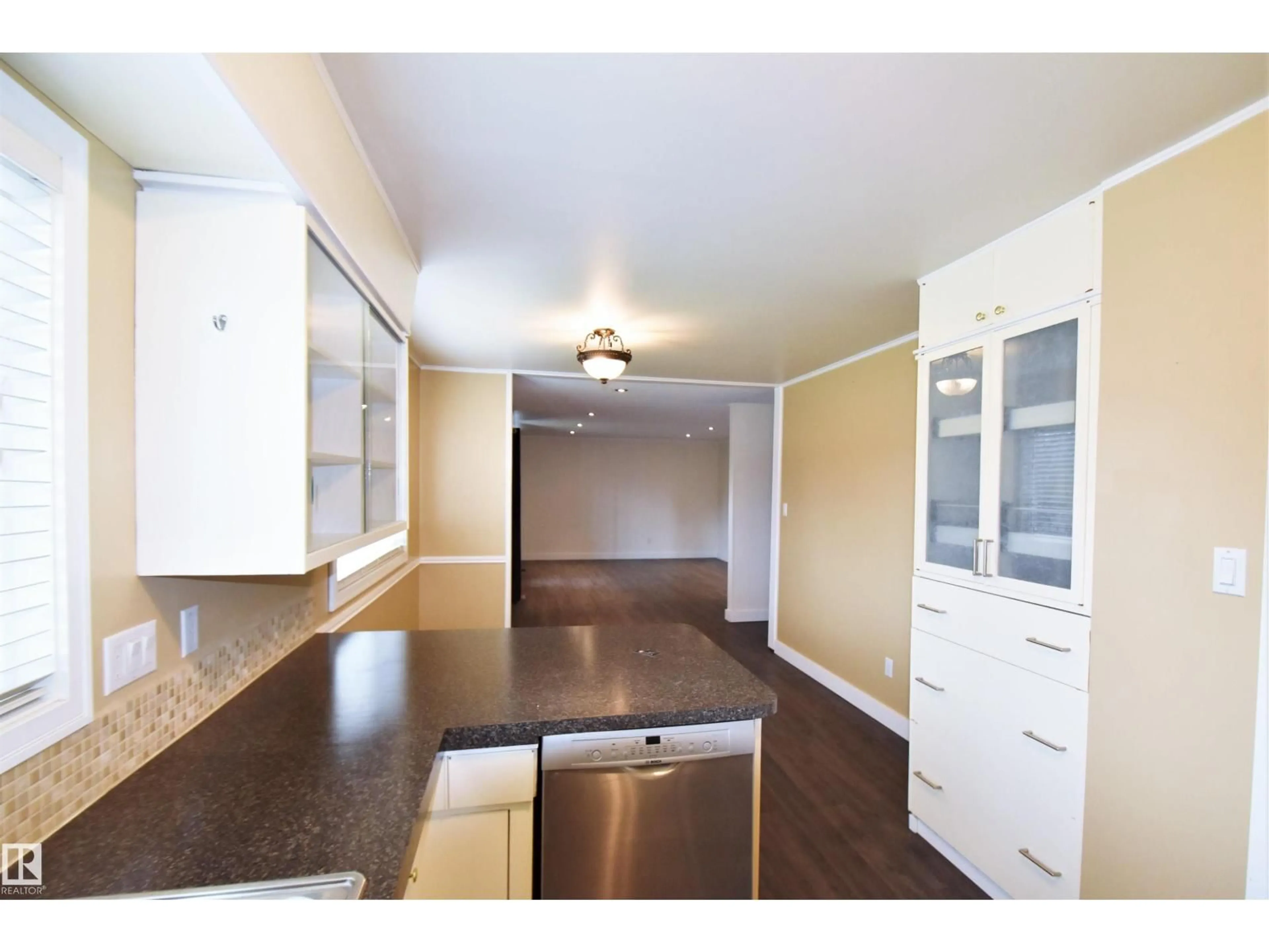 Open concept kitchen, wood/laminate floor for 5114 44 AV, St. Paul Town Alberta T0A3A4