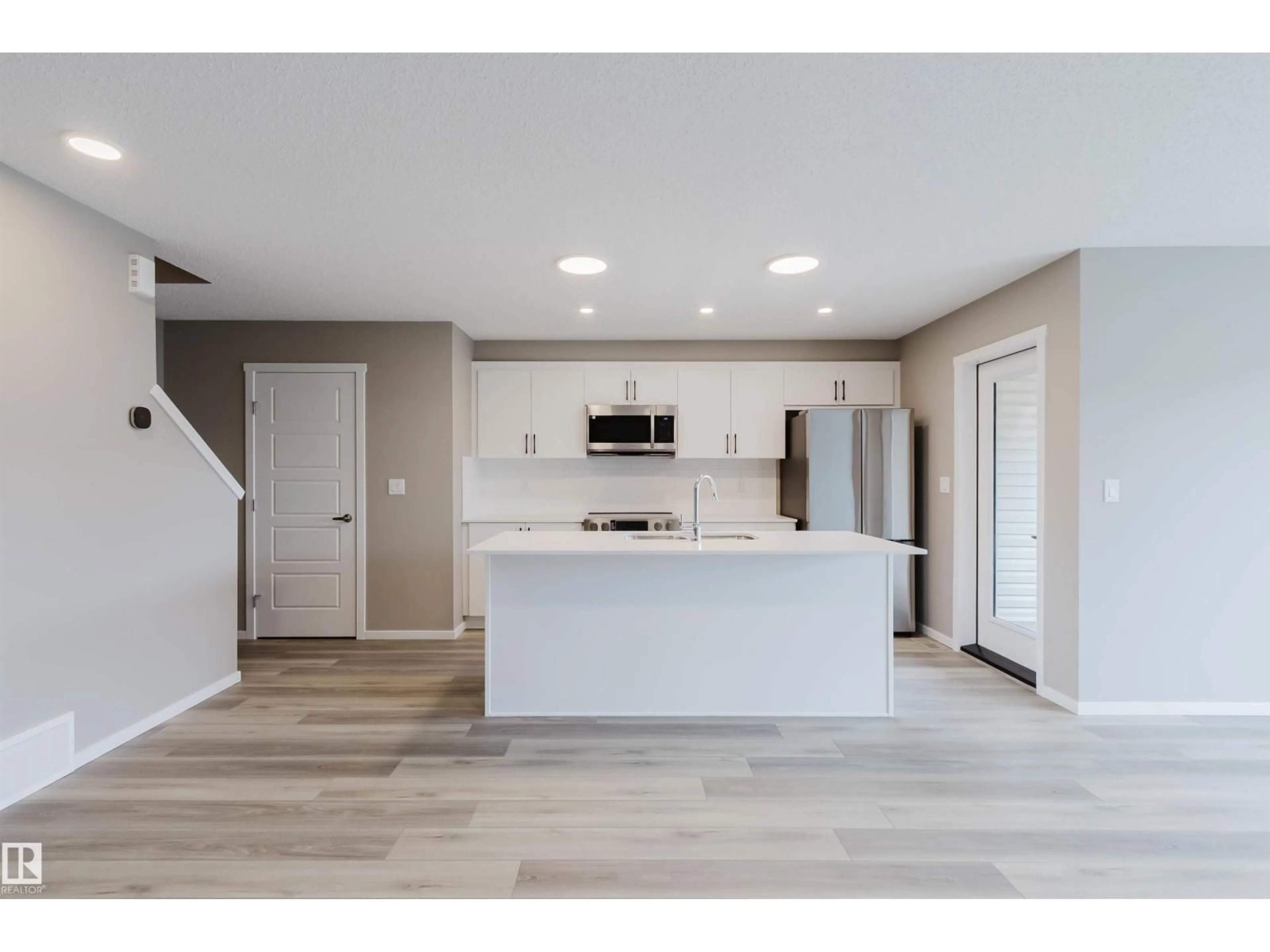 Open concept kitchen, unknown for 20418 15A AV, Edmonton Alberta T6M2P7