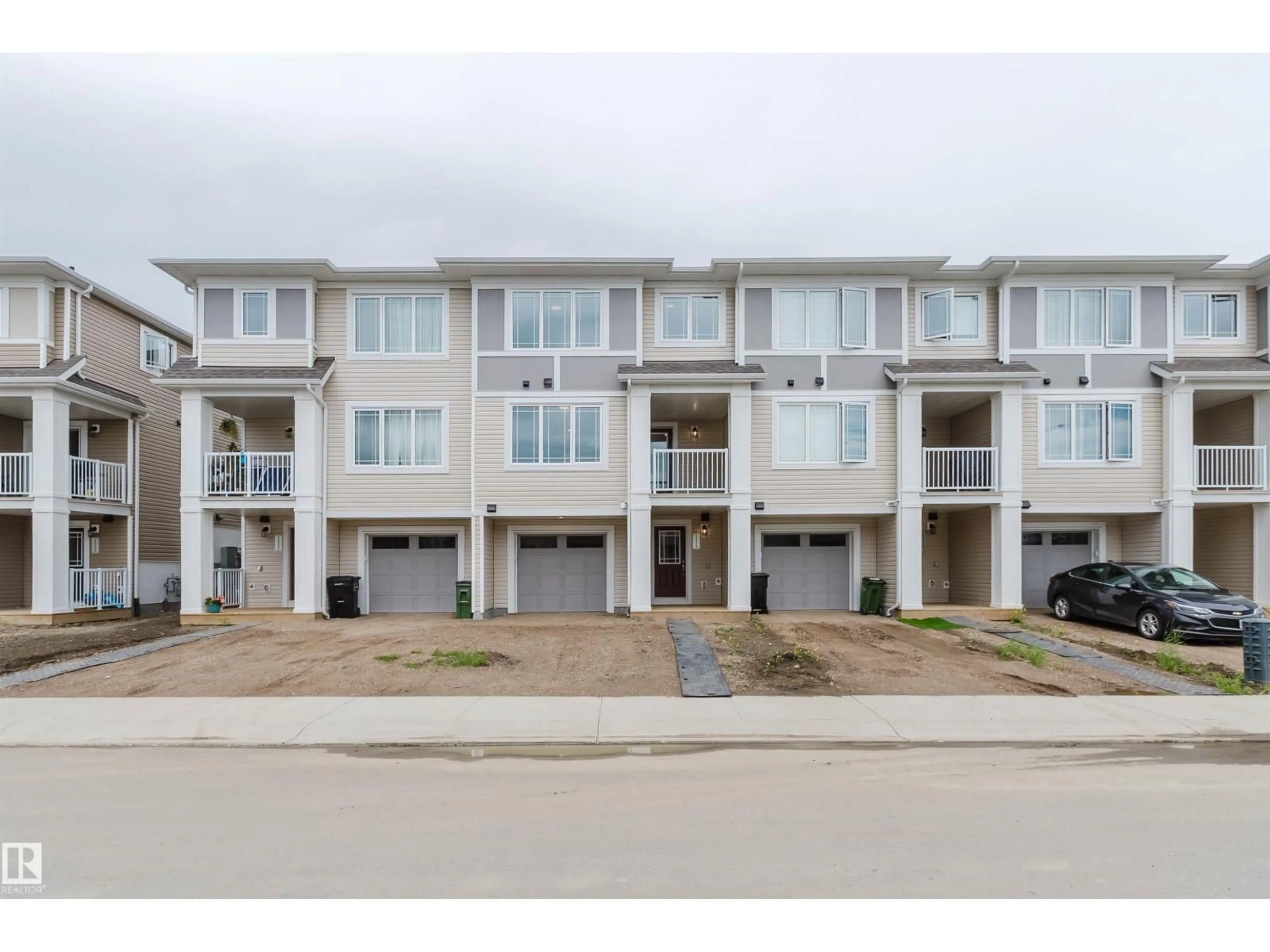 A pic from outside/outdoor area/front of a property/back of a property/a pic from drone, street for 20418 15A AV, Edmonton Alberta T6M2P7