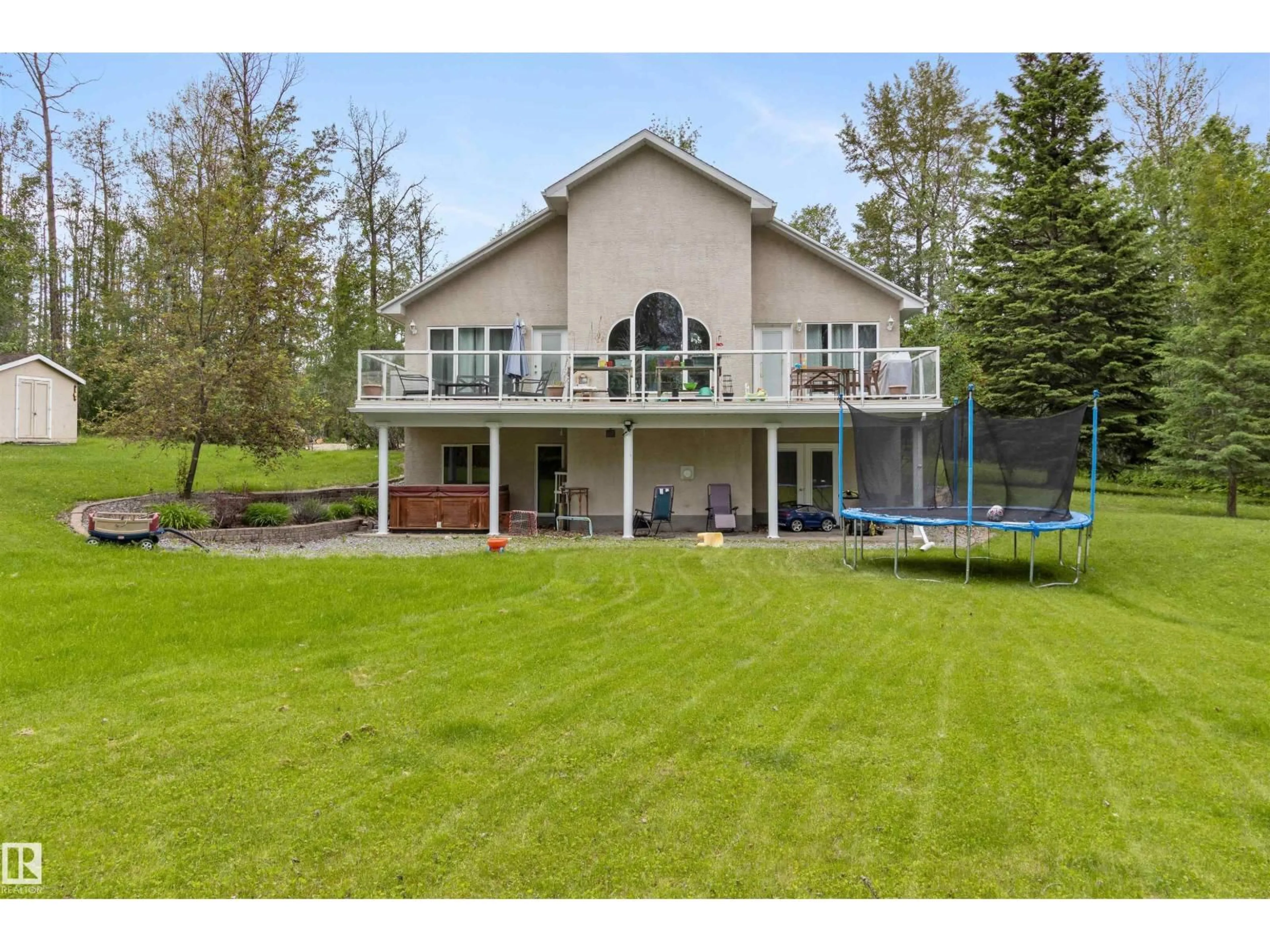 A pic from outside/outdoor area/front of a property/back of a property/a pic from drone, water/lake/river/ocean view for #302 - 49006 RANGE ROAD 73, Rural Brazeau County Alberta T7A2A2
