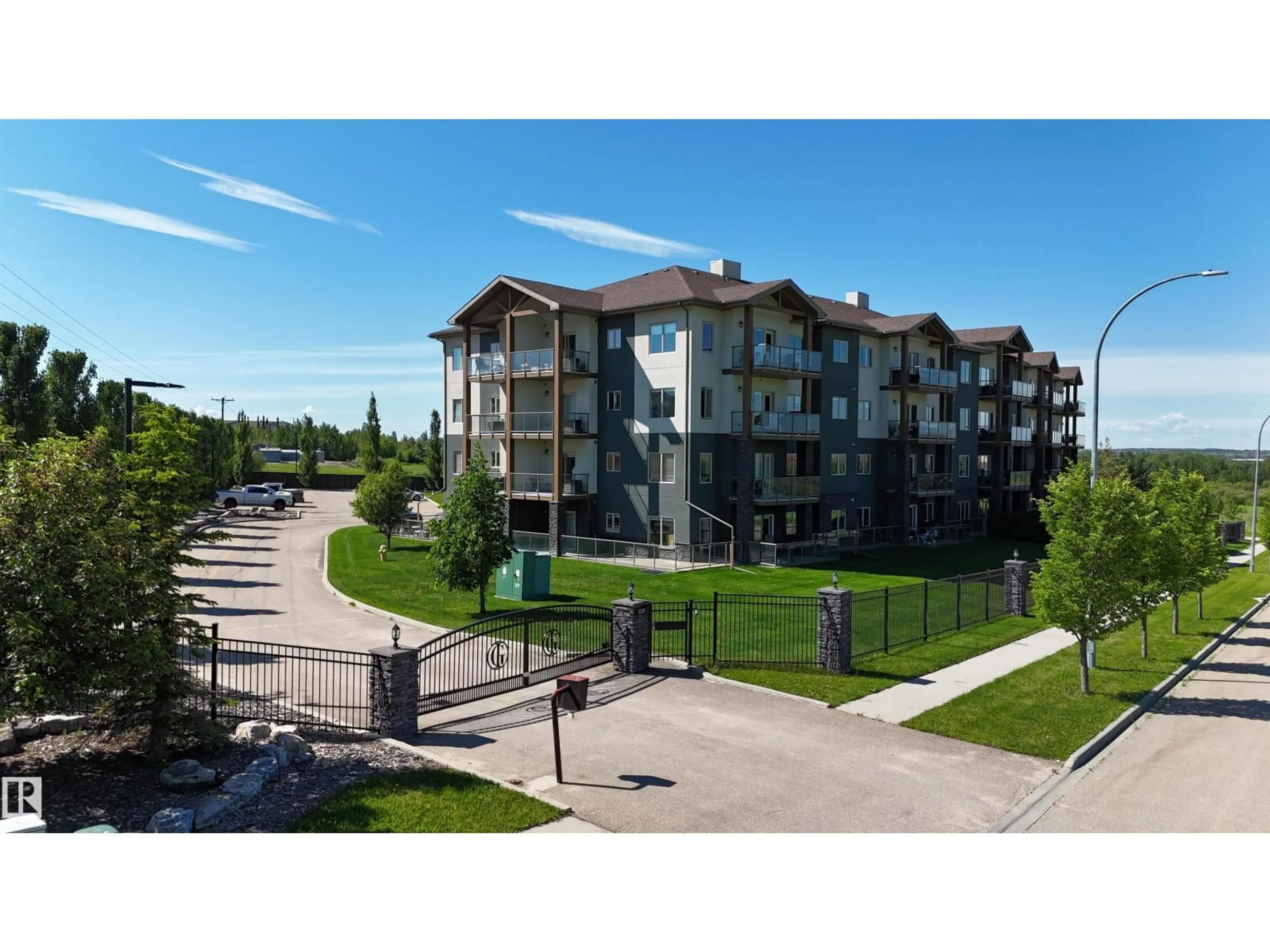 A pic from outside/outdoor area/front of a property/back of a property/a pic from drone, unknown for 202 - 5201 BROUGHAM DR, Drayton Valley Alberta T7A0A1