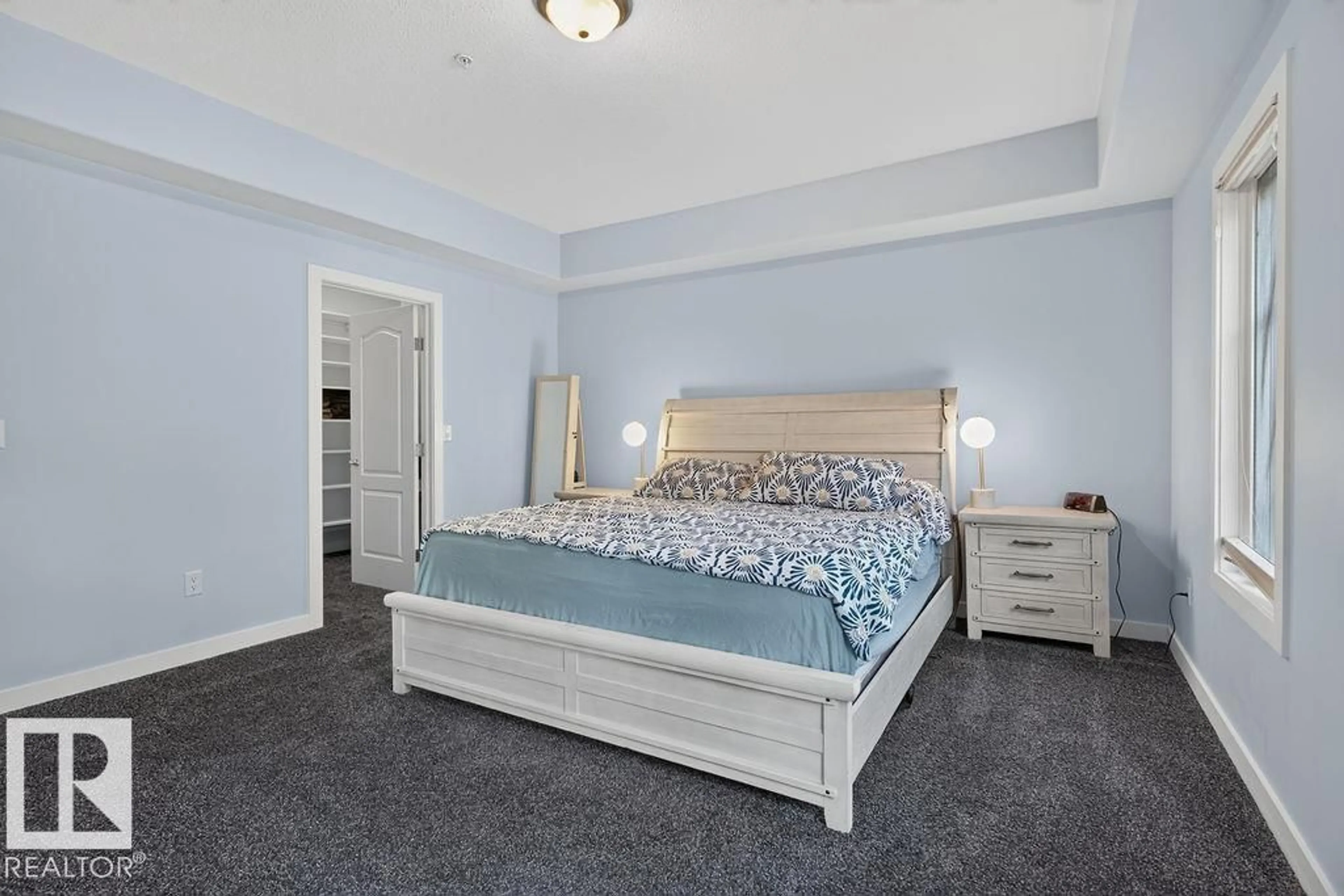 Bedroom with bed, carpet floor for #106 - 1406 HODGSON WY, Edmonton Alberta T6R3K1
