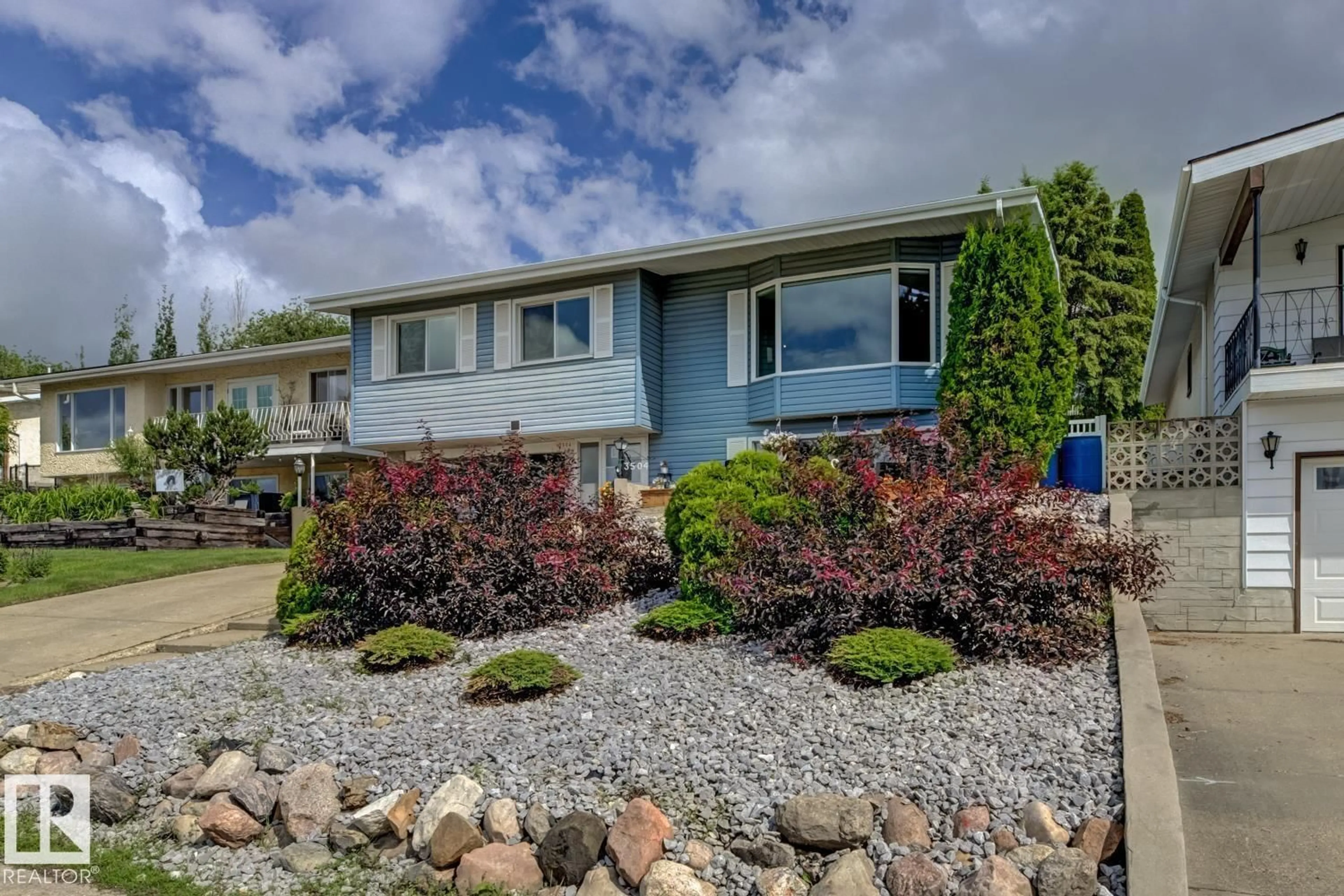 Home with vinyl exterior material, unknown for 3504 102 AV, Edmonton Alberta T5W0A3