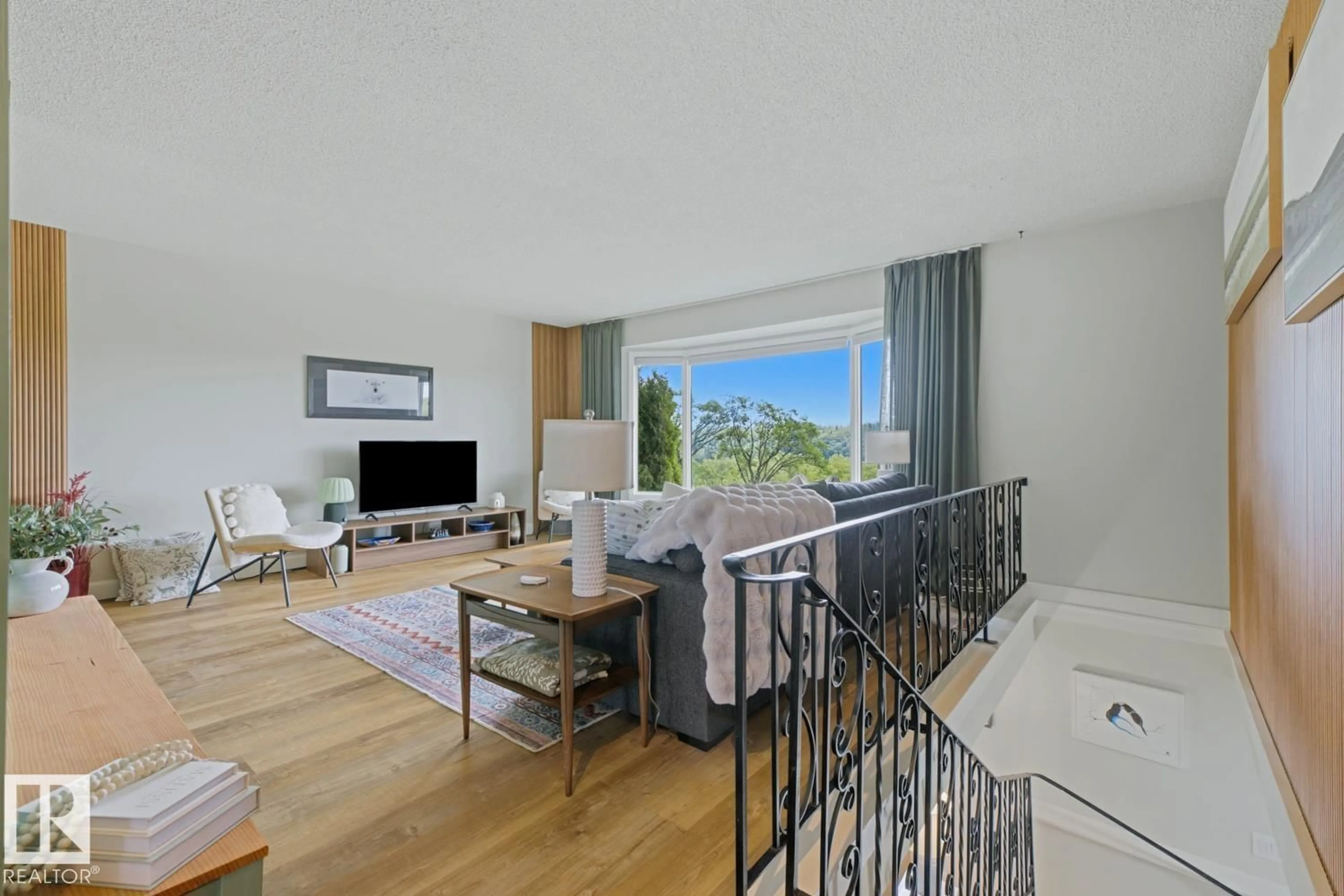 Living room with furniture, unknown for 3504 102 AV, Edmonton Alberta T5W0A3