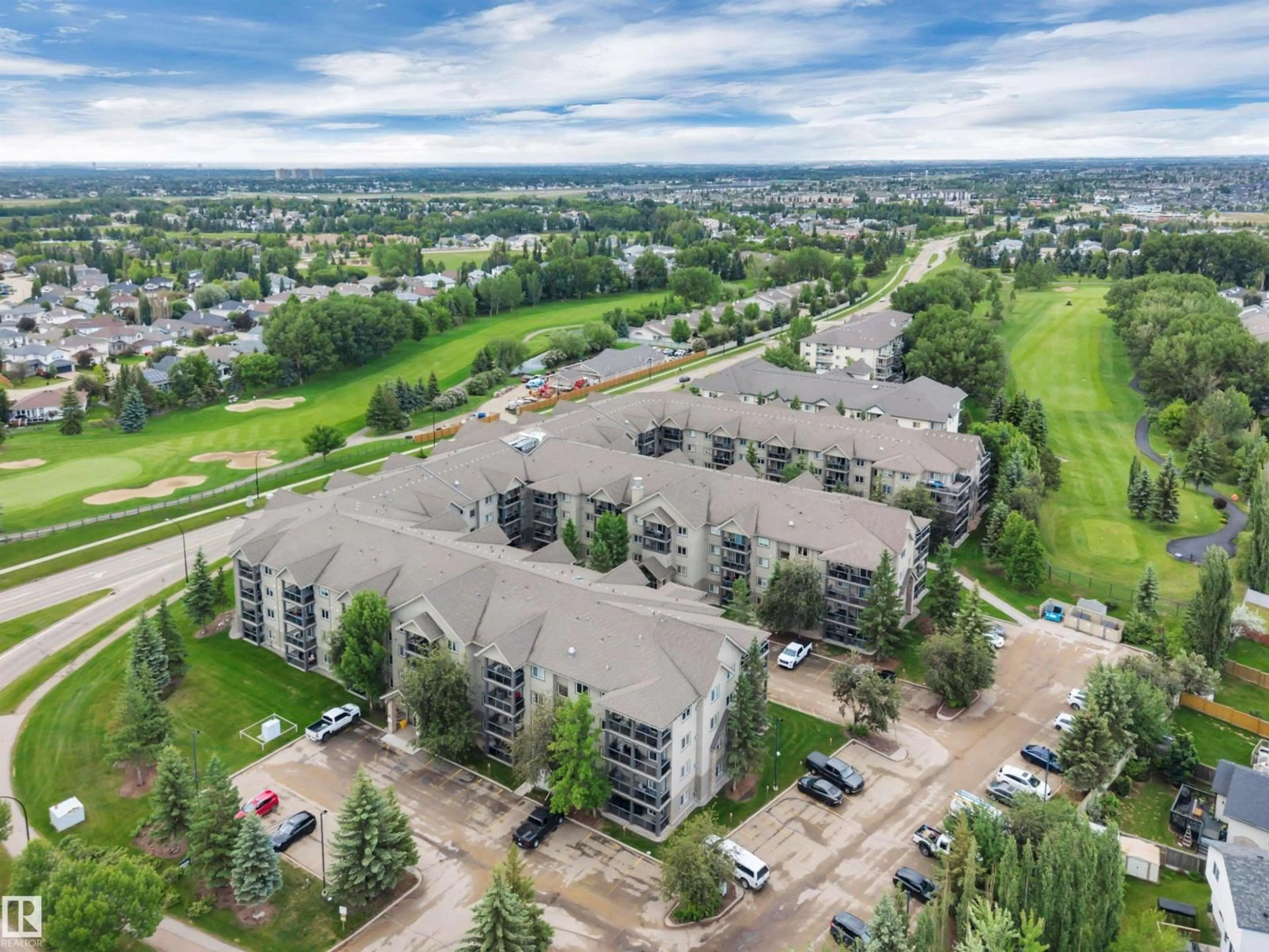 A pic from outside/outdoor area/front of a property/back of a property/a pic from drone, unknown for #103 - 279 SUDER GREENS DR, Edmonton Alberta T5T6X6