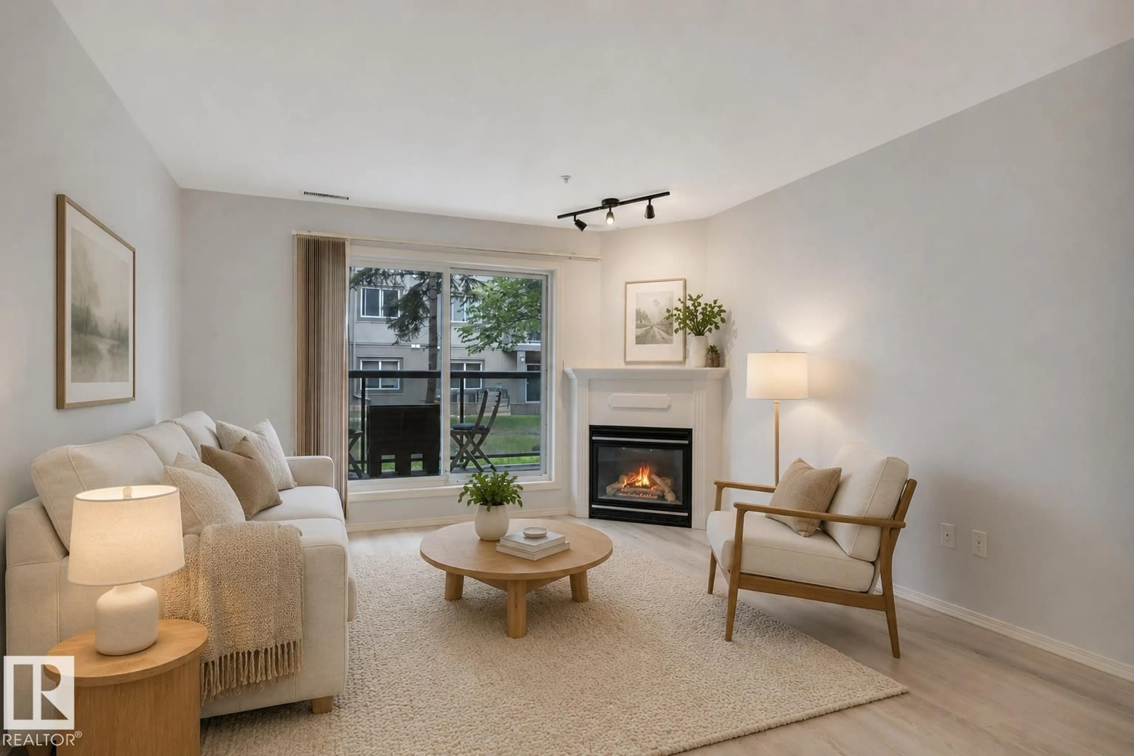 Living room with furniture, unknown for #103 - 279 SUDER GREENS DR, Edmonton Alberta T5T6X6