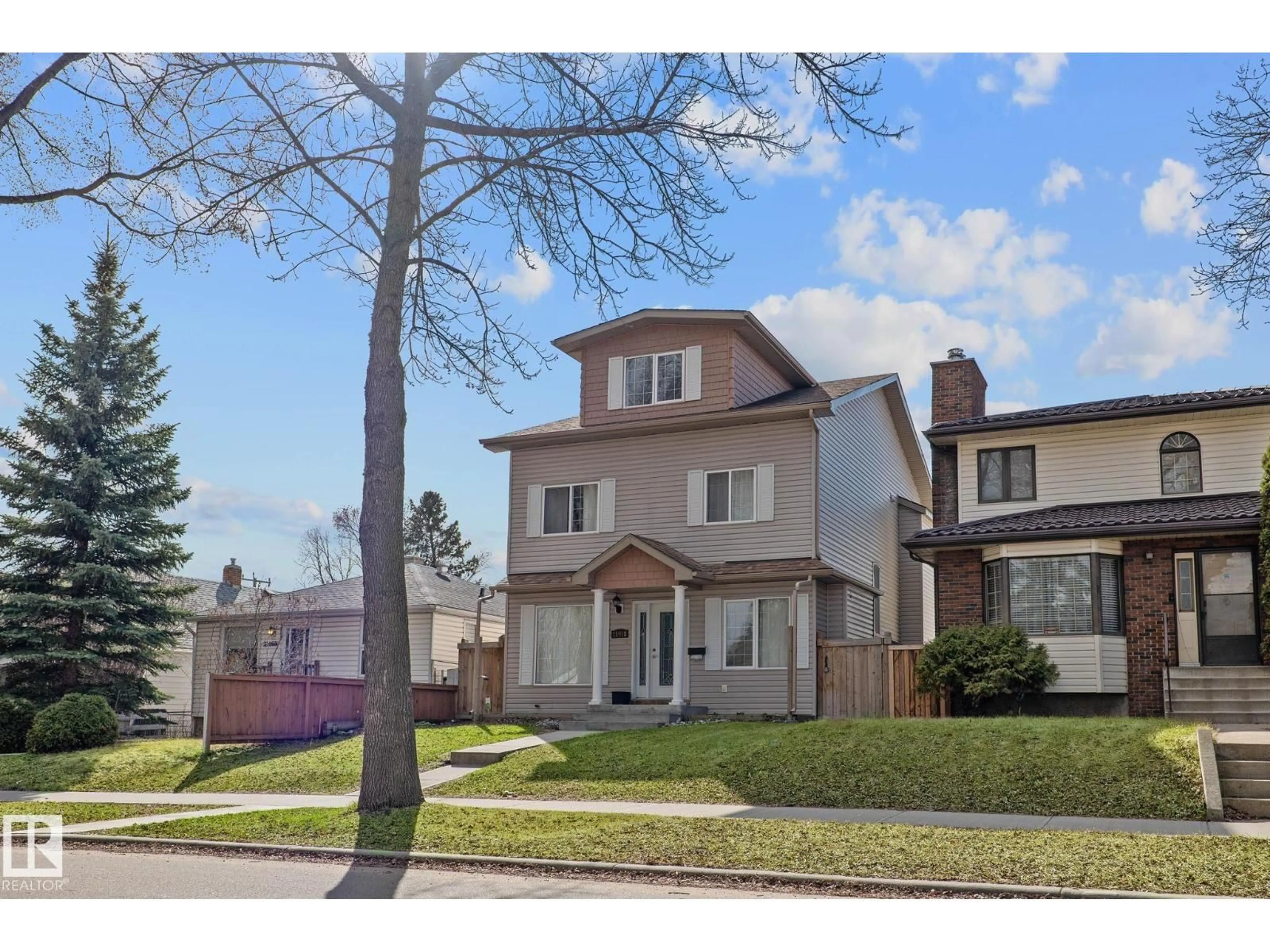 Home with brick exterior material, street for 11918 68 ST NW, Edmonton Alberta T5B1P7