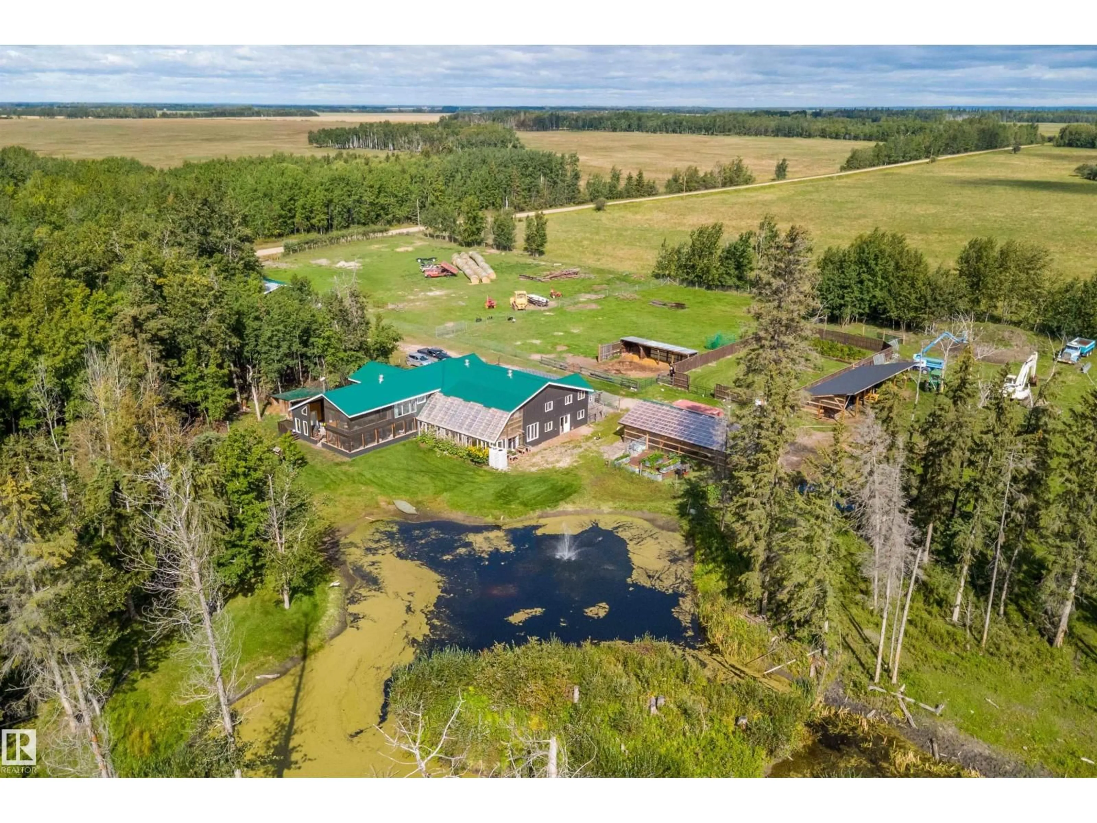 A pic from outside/outdoor area/front of a property/back of a property/a pic from drone, water/lake/river/ocean view for 60213 RGE ROAD 260, Rural Westlock County Alberta T7P2P5