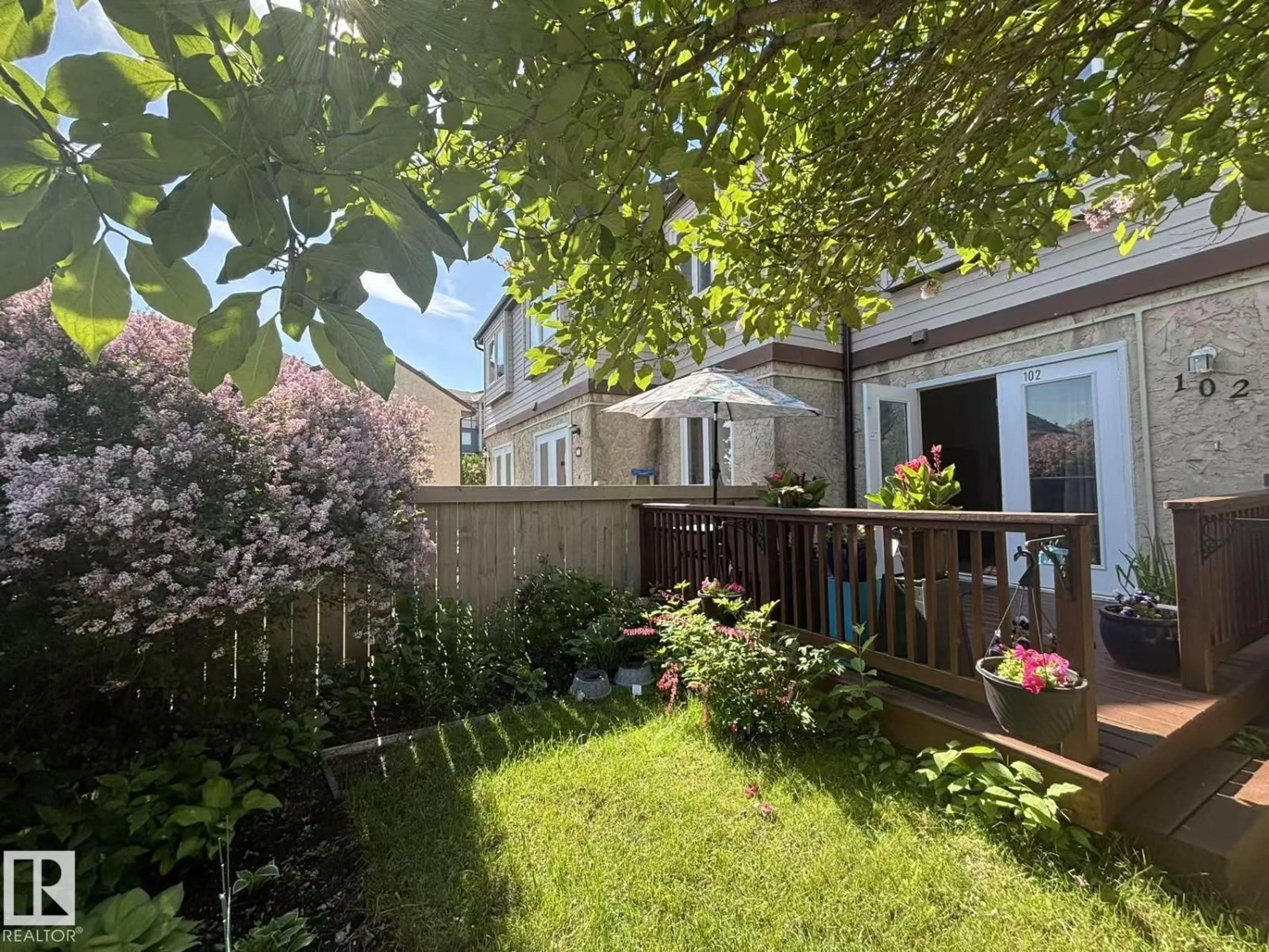 A pic from outside/outdoor area/front of a property/back of a property/a pic from drone, street for 102 ROYAL TC, Edmonton Alberta T6J4R2