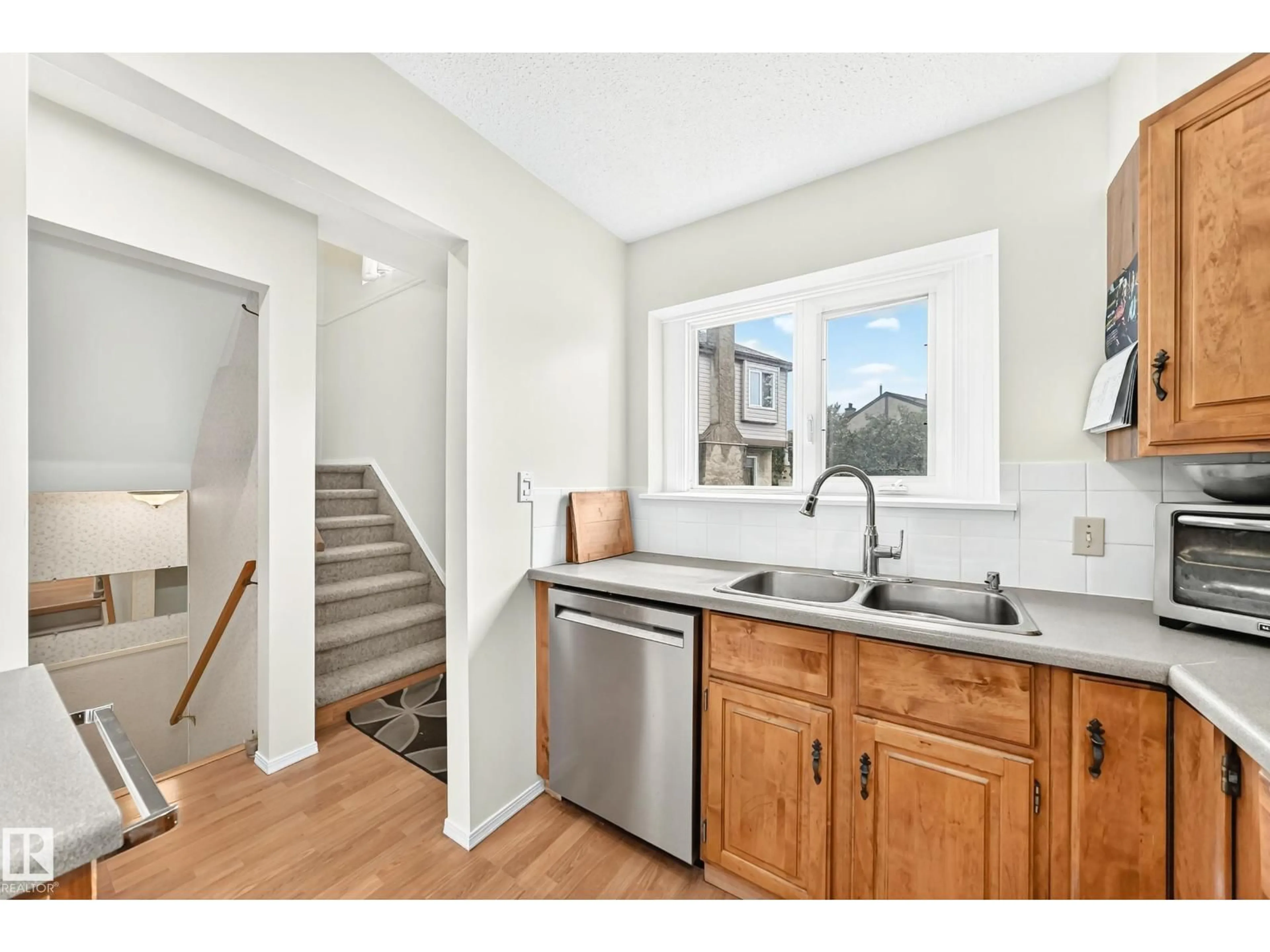 Open concept kitchen, unknown for 102 ROYAL TC, Edmonton Alberta T6J4R2