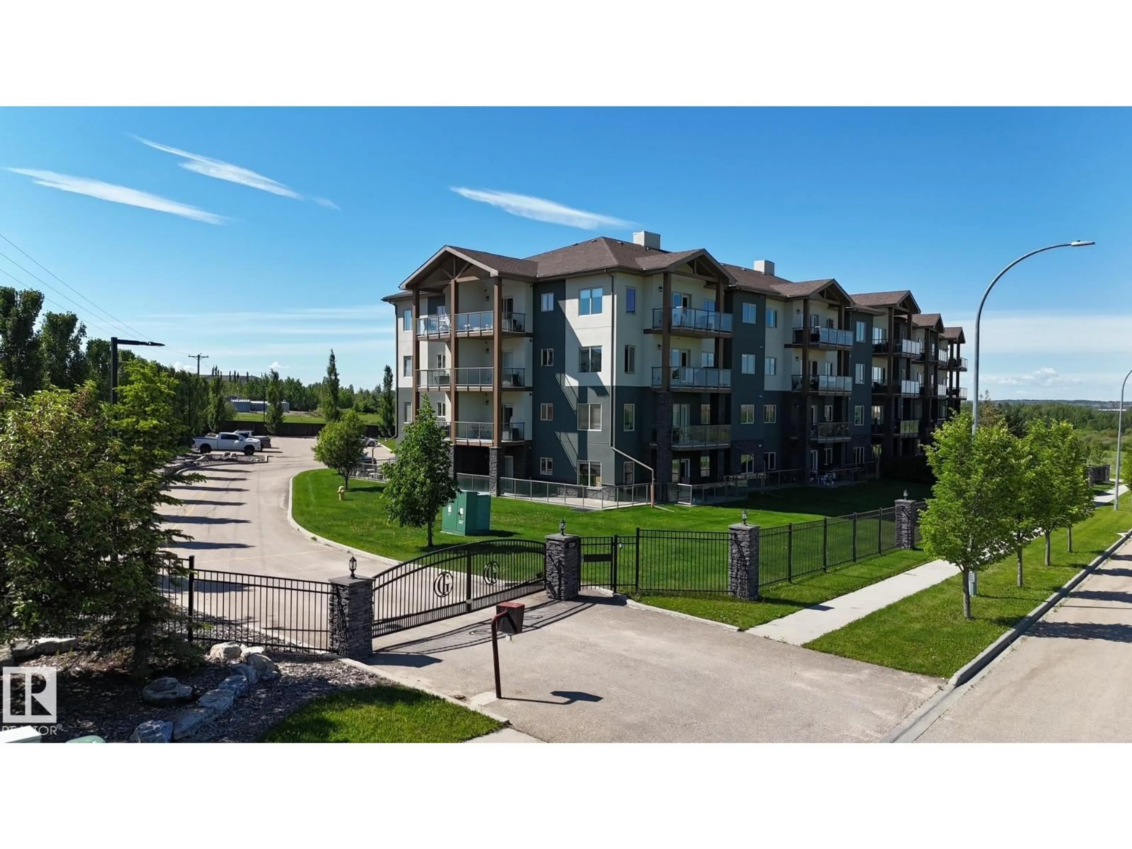 A pic from outside/outdoor area/front of a property/back of a property/a pic from drone, unknown for #204 - 5201 BROUGHAM DR, Drayton Valley Alberta T7A0C8