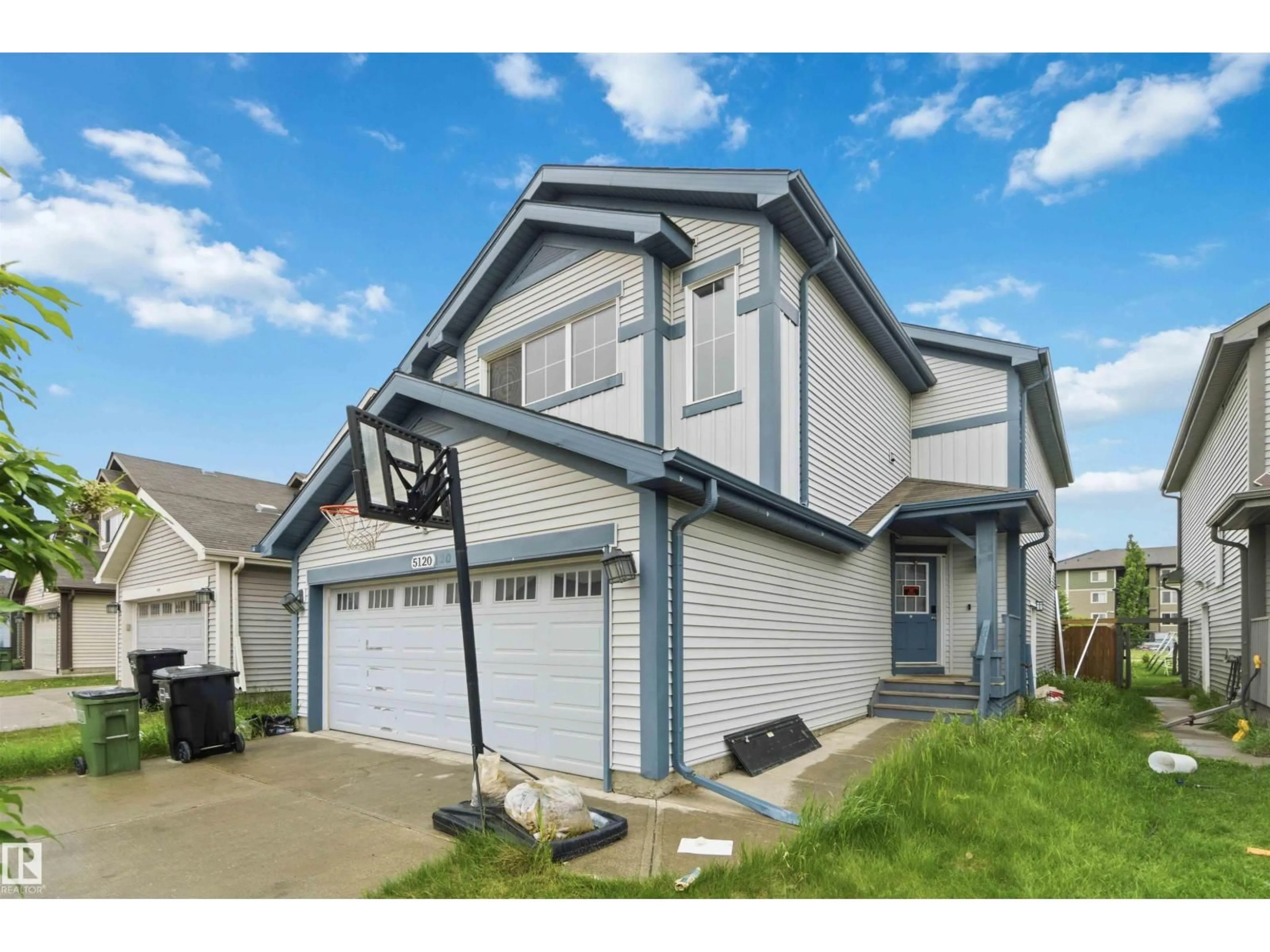 Home with vinyl exterior material, street for 5120 19 AV, Edmonton Alberta T6X1A4
