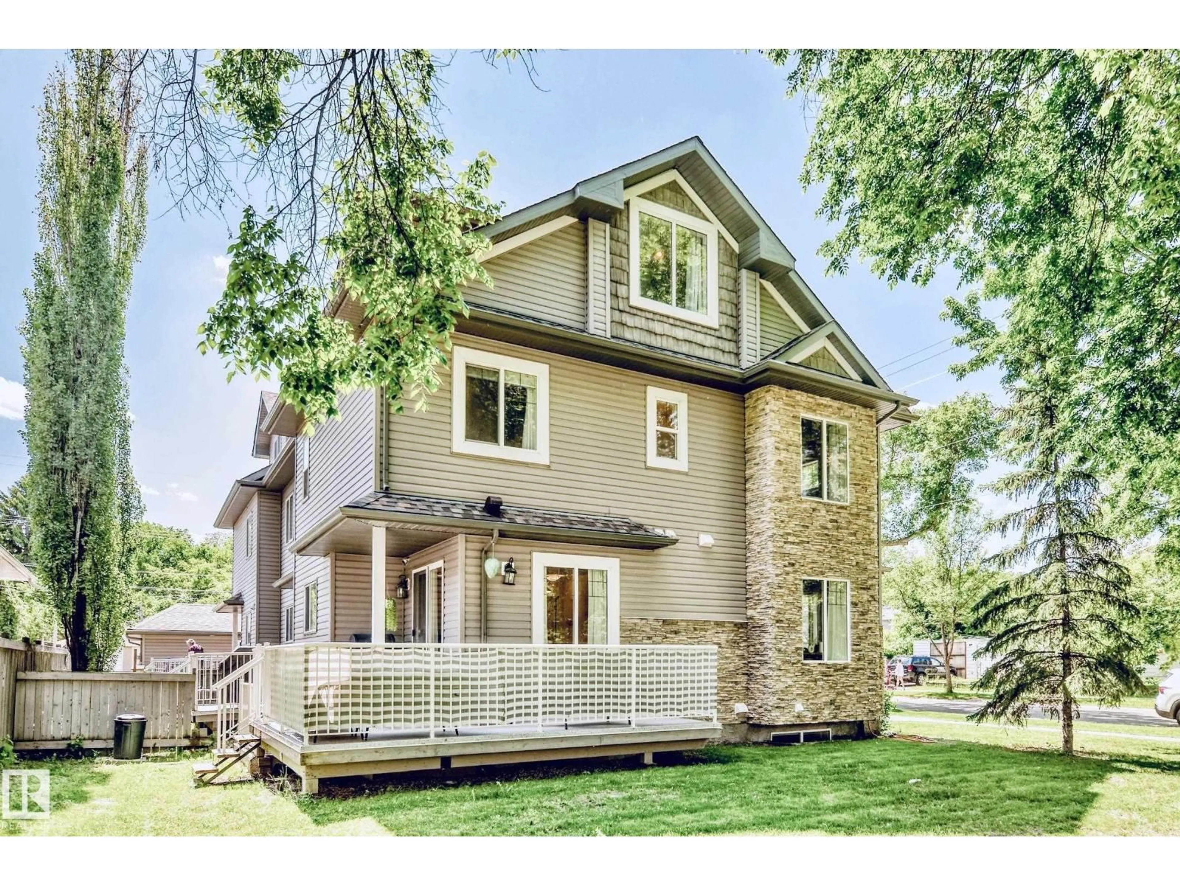 Home with vinyl exterior material, street for 7021 95 ST, Edmonton Alberta T6E1B9
