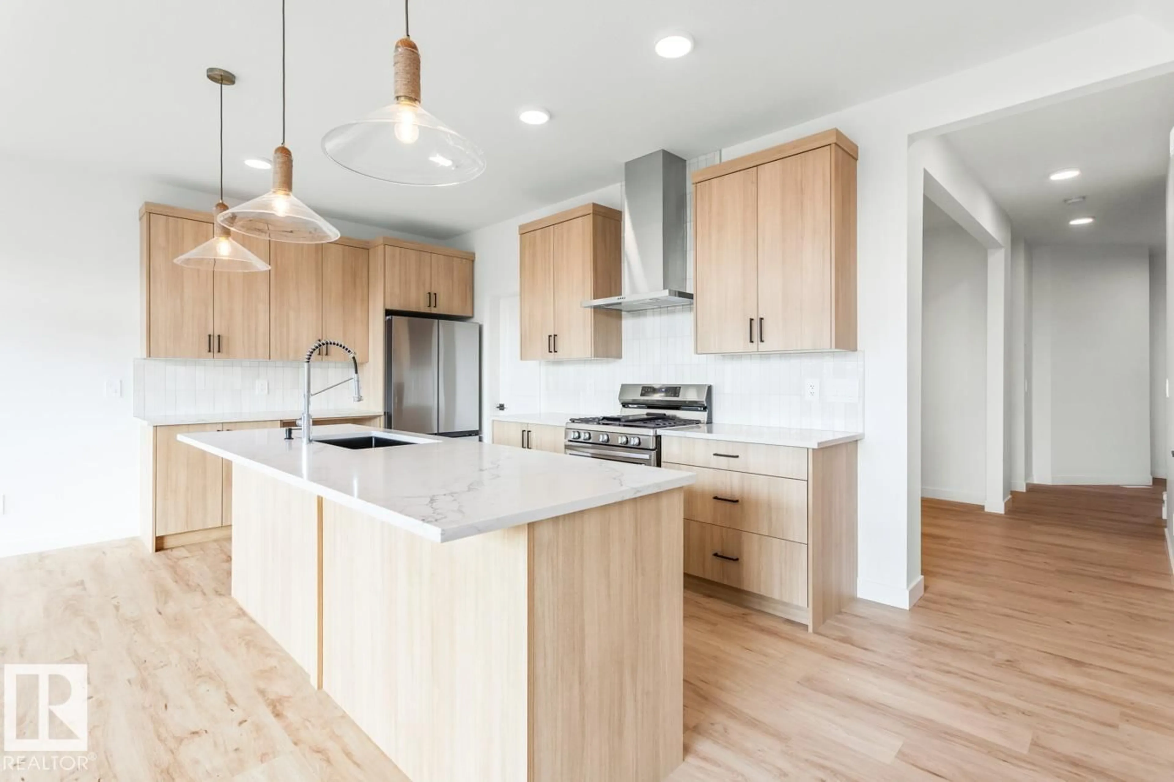Open concept kitchen, wood/laminate floor for 125 CUDDIE DR, Sherwood Park Alberta T8H3C8