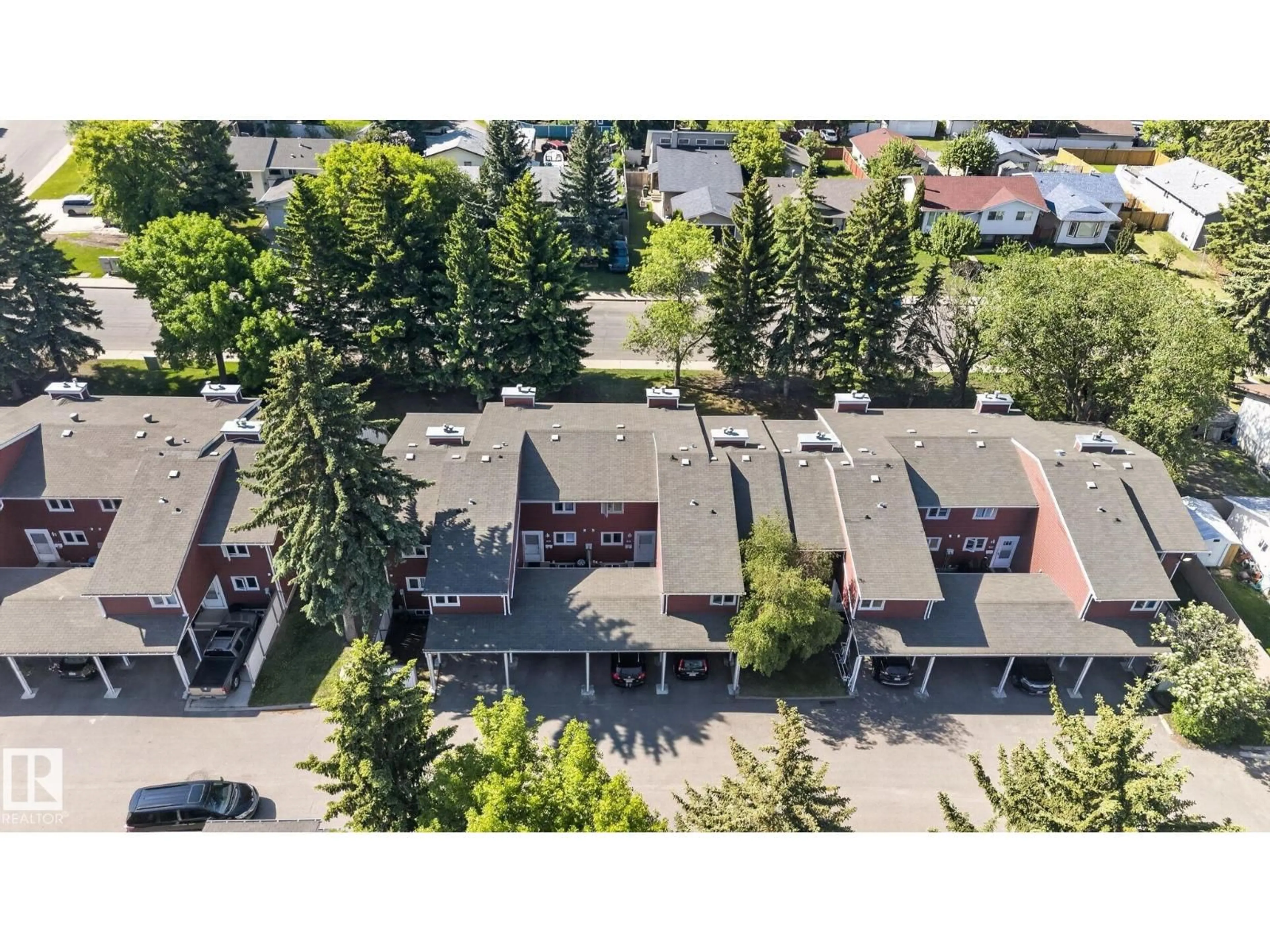 A pic from outside/outdoor area/front of a property/back of a property/a pic from drone, street for #10 - 1904 48 ST, Edmonton Alberta T6L5H3