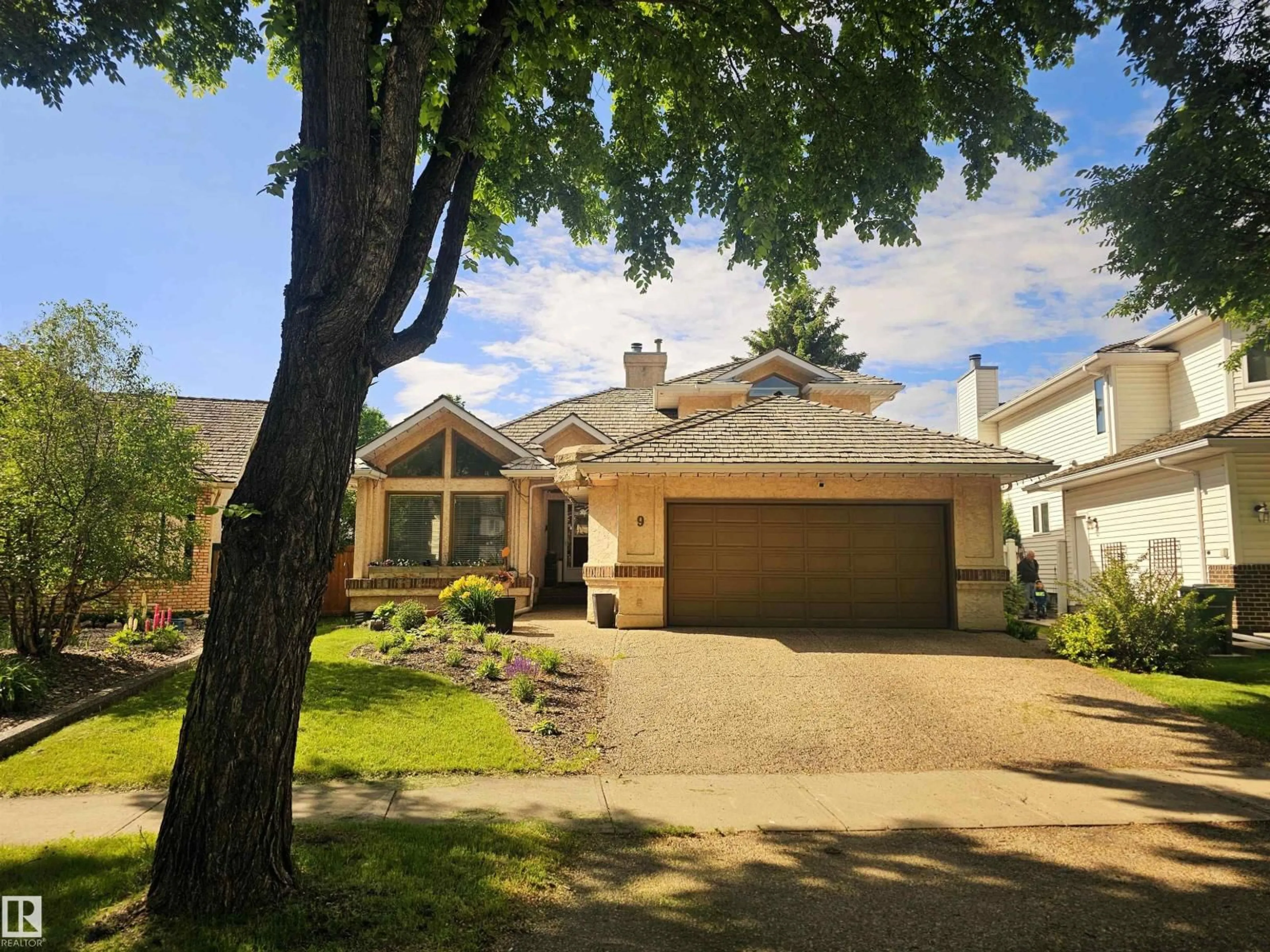 A pic from outside/outdoor area/front of a property/back of a property/a pic from drone, street for 9 EMERALD TC, St. Albert Alberta T8N5S4