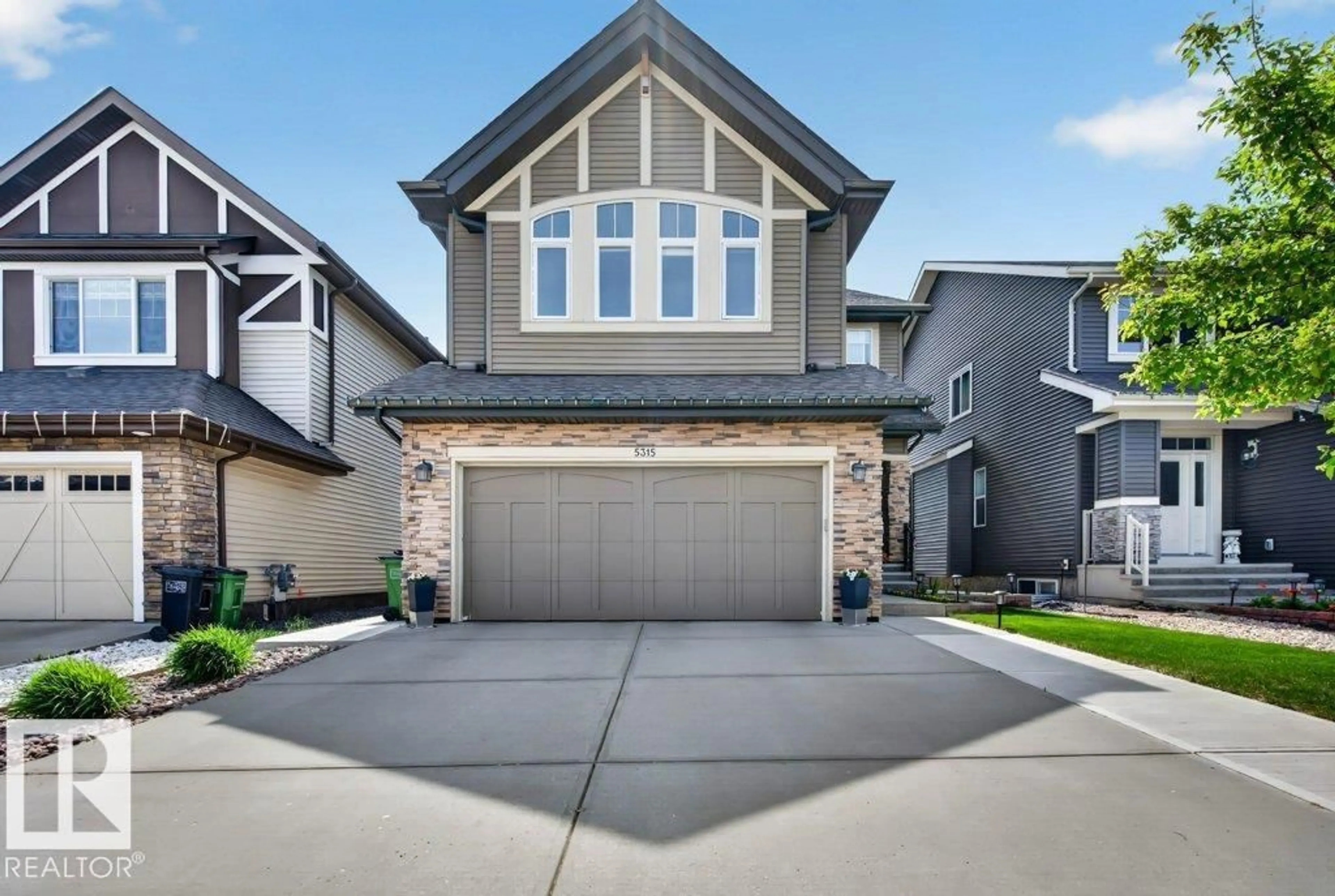 Home with vinyl exterior material, street for 5315 20 AV, Edmonton Alberta T6X1V4