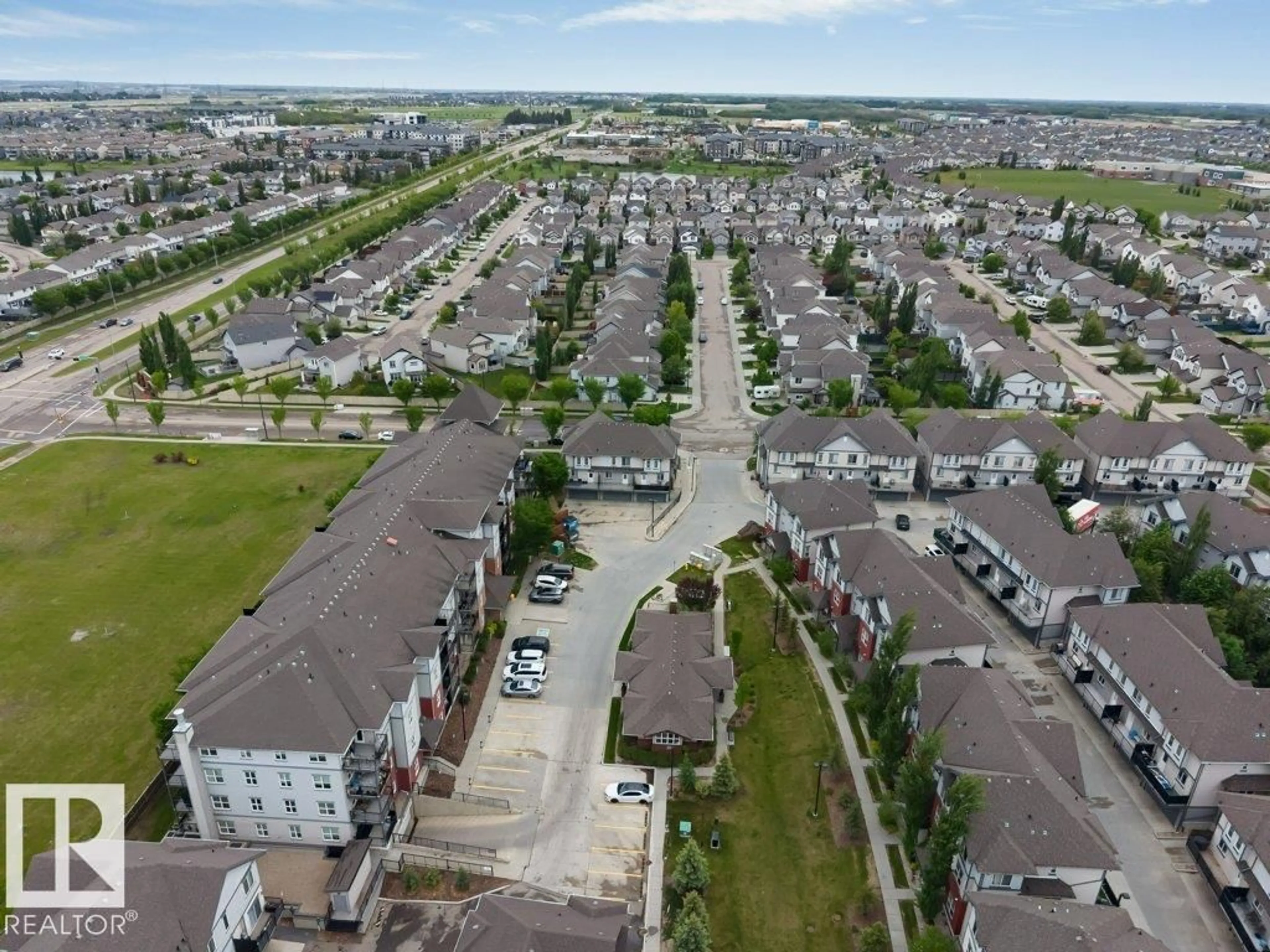 A pic from outside/outdoor area/front of a property/back of a property/a pic from drone, street for #401 - 667 WATT BV, Edmonton Alberta T6X0Y2