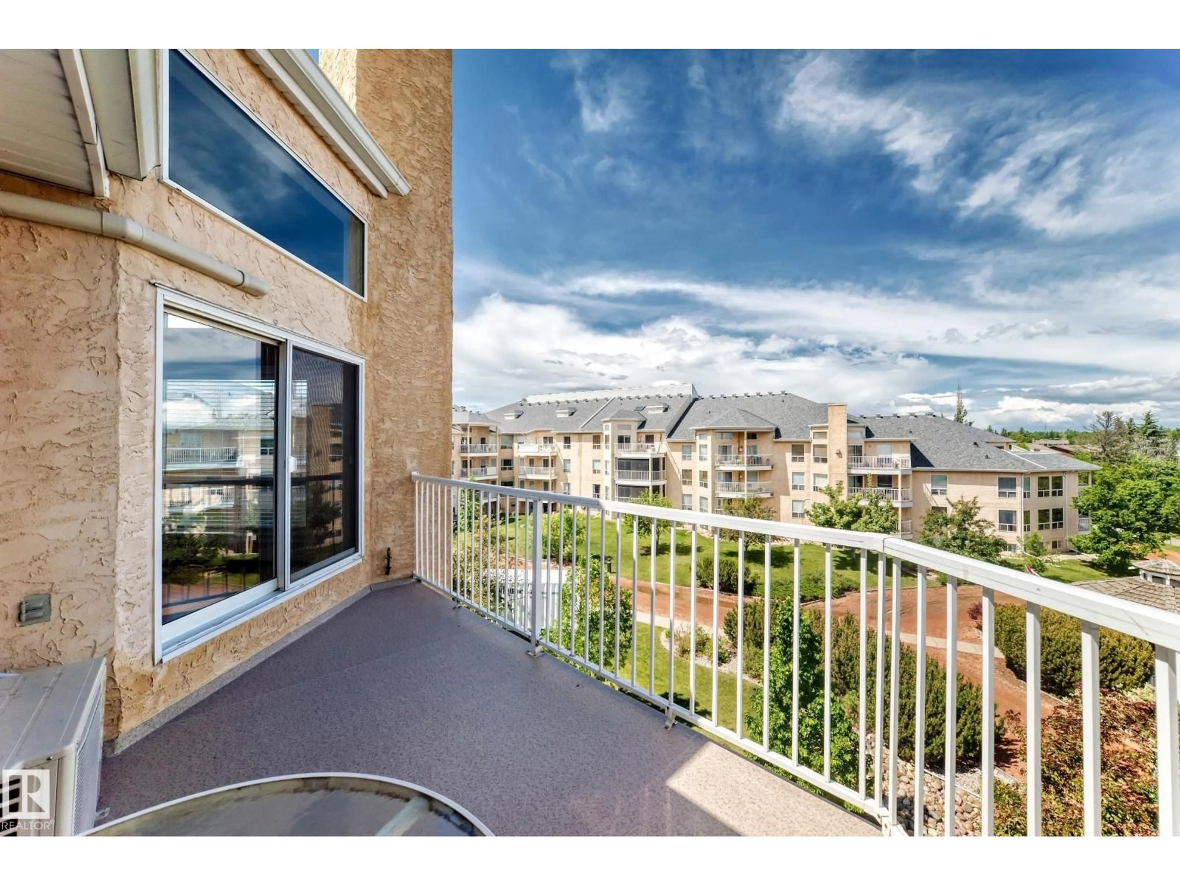 Balcony in the apartment, city buildings view from balcony for 15499 - 422 CASTLE DOWNS RD, Edmonton Alberta T5X5Y3