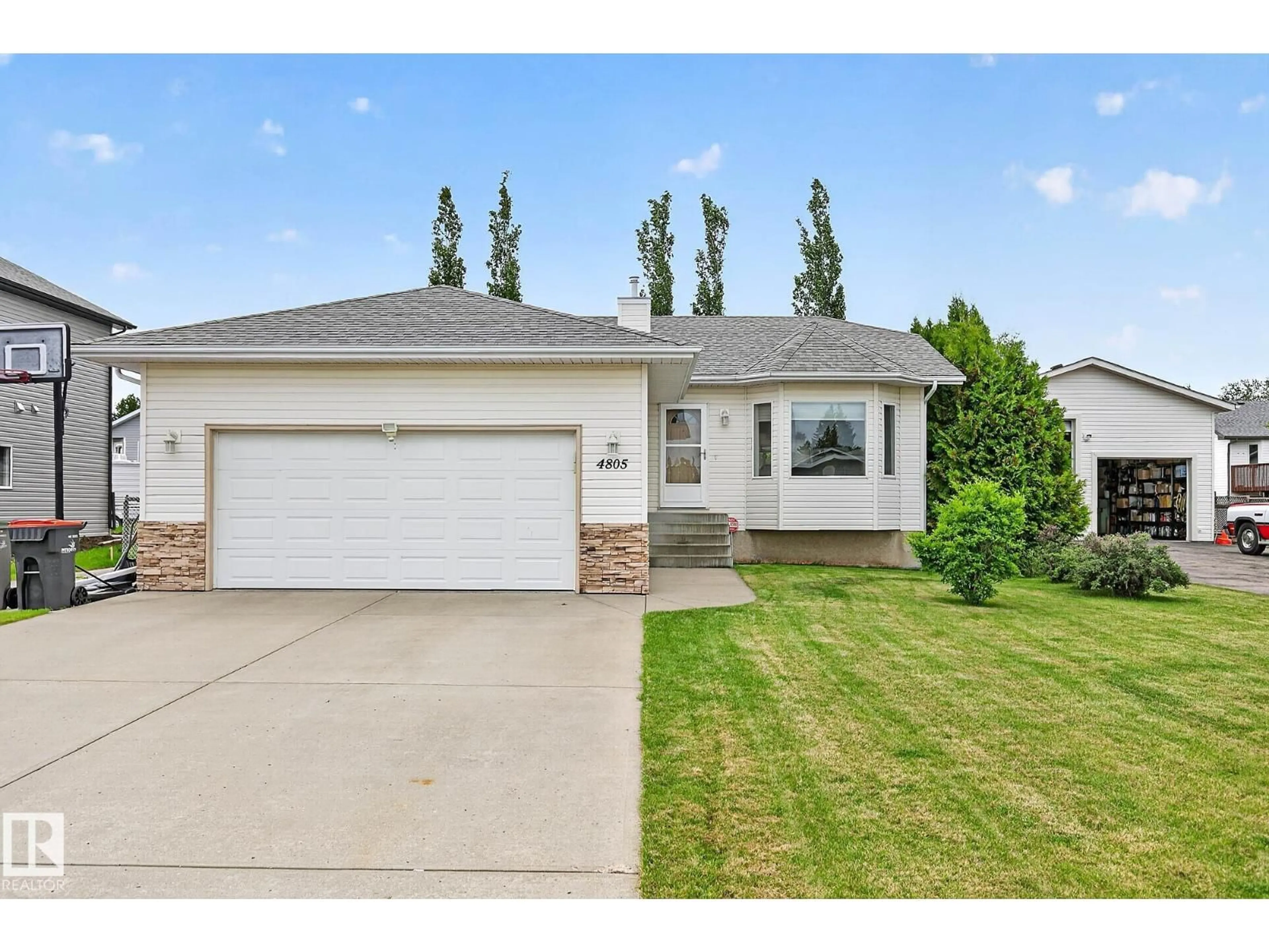 Home with vinyl exterior material, street for 4805 53 AV, Thorsby Alberta T0C2P0