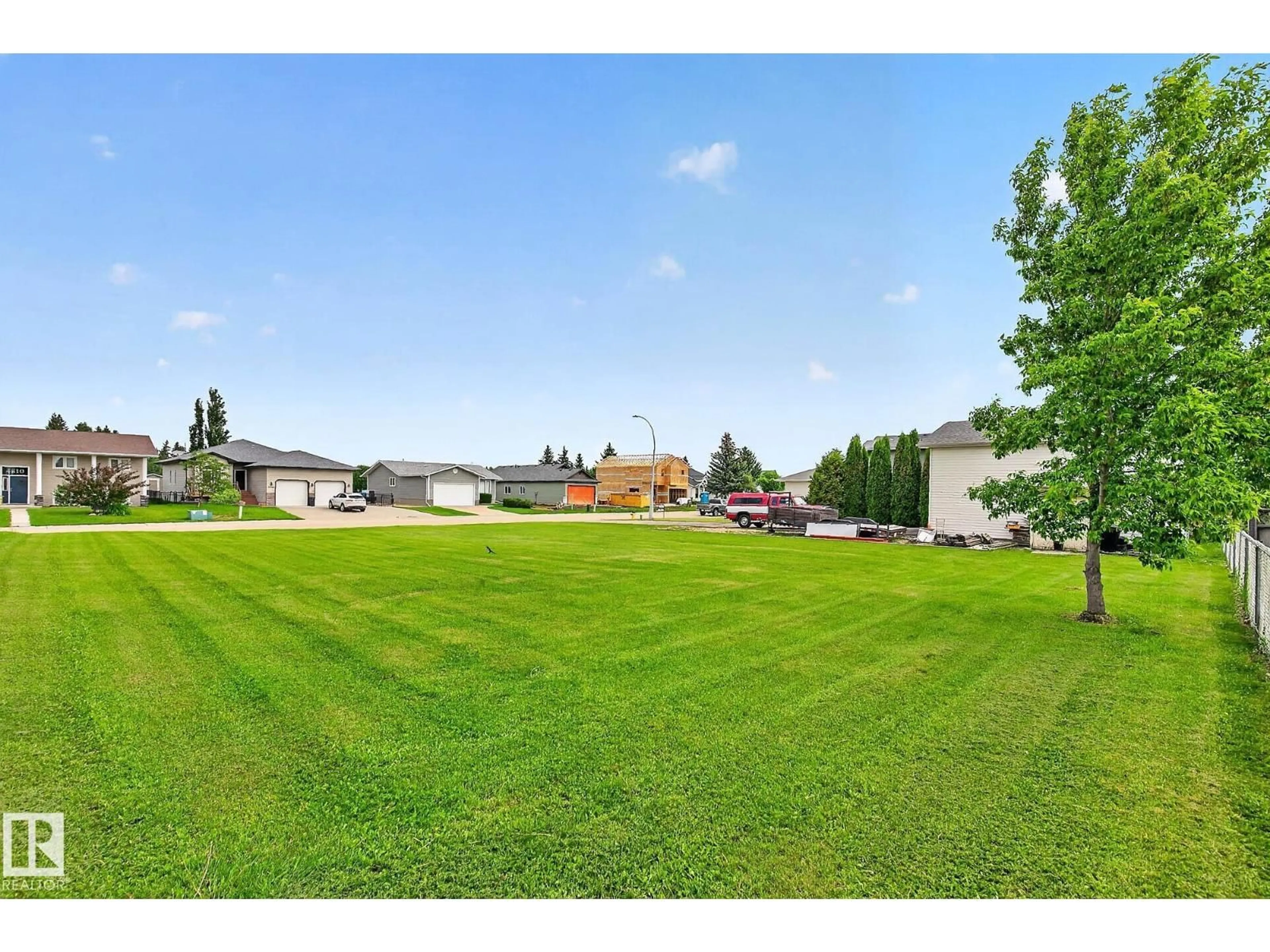 A pic from outside/outdoor area/front of a property/back of a property/a pic from drone, water/lake/river/ocean view for 4805 53 AV, Thorsby Alberta T0C2P0