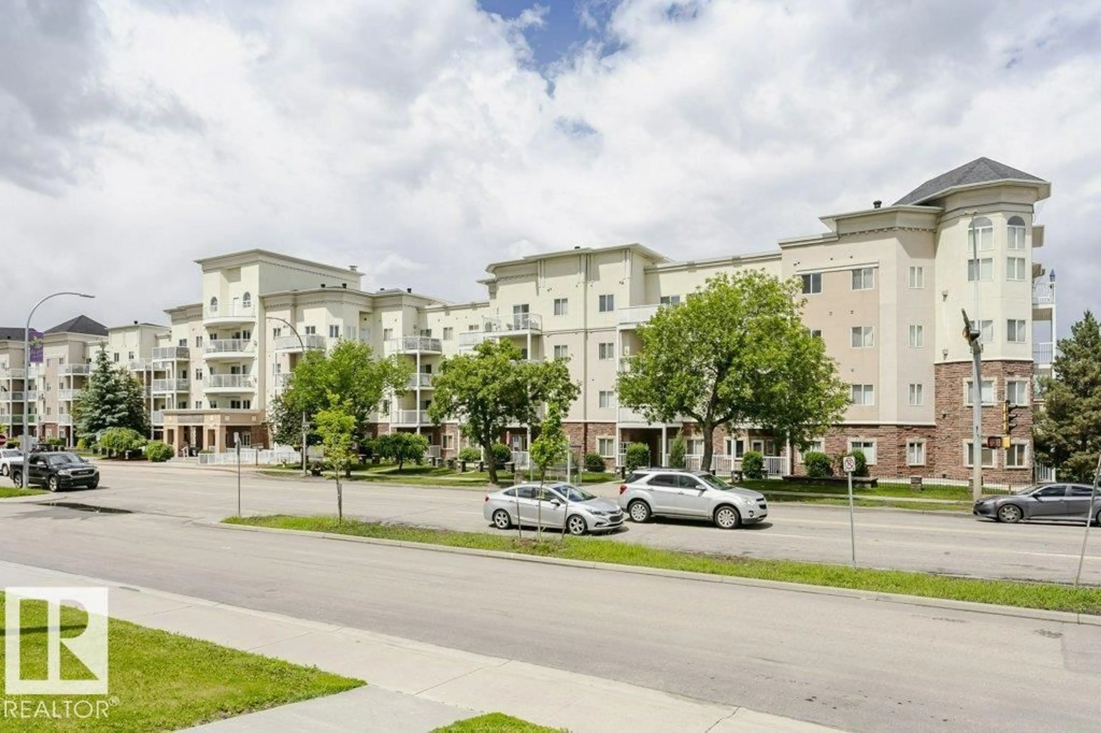 A pic from outside/outdoor area/front of a property/back of a property/a pic from drone, street for 110 8528 82 AV NW, Edmonton Alberta T6C0Y8