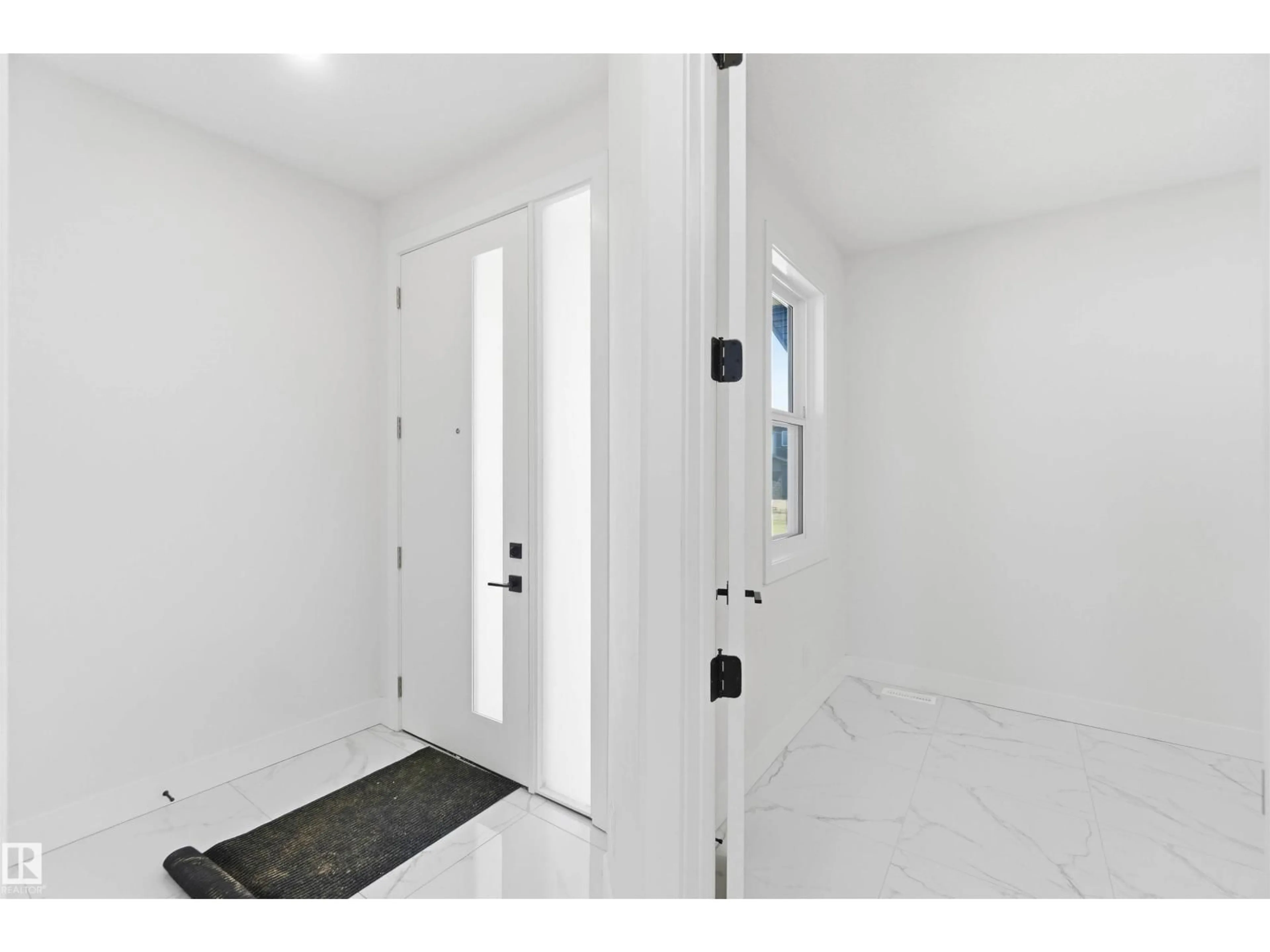 Indoor entryway for 415 PINE PT, Leduc Alberta T9E1S7