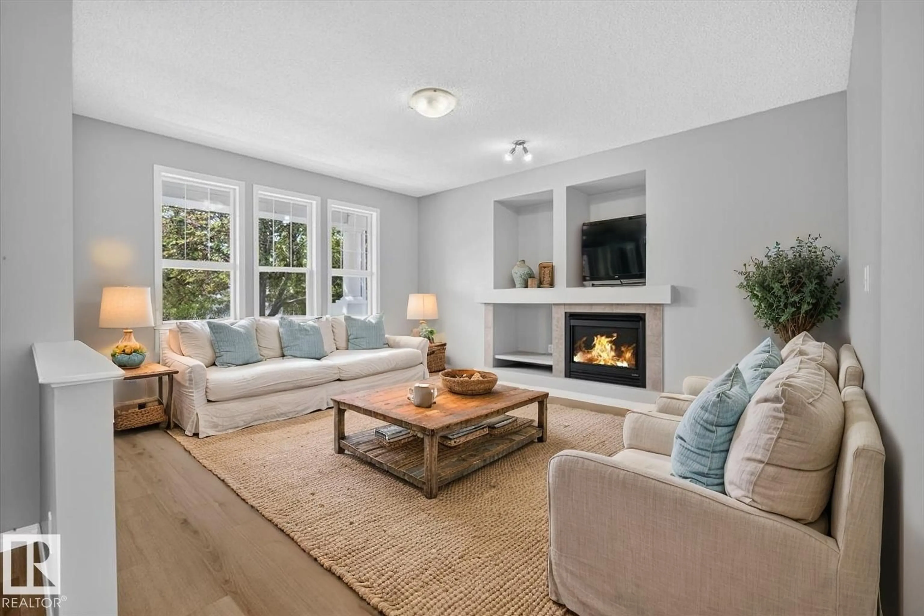Living room with furniture, unknown for 7704 16 AV, Edmonton Alberta T6X1M2