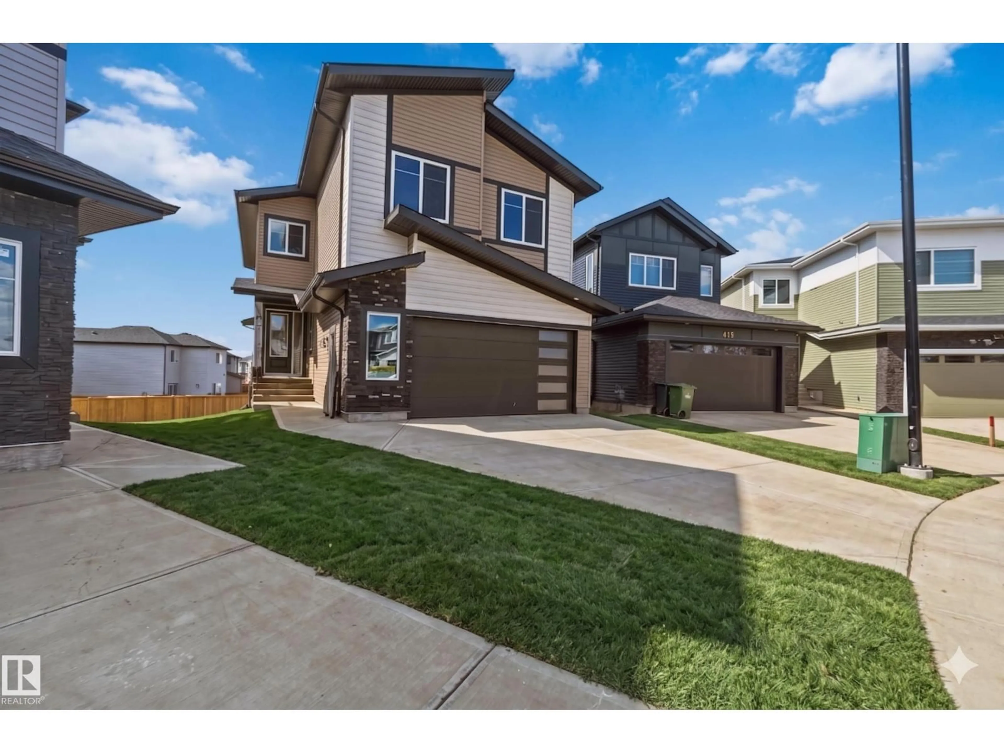 Home with vinyl exterior material, street for 417 PINE PT, Leduc Alberta T9E1S7