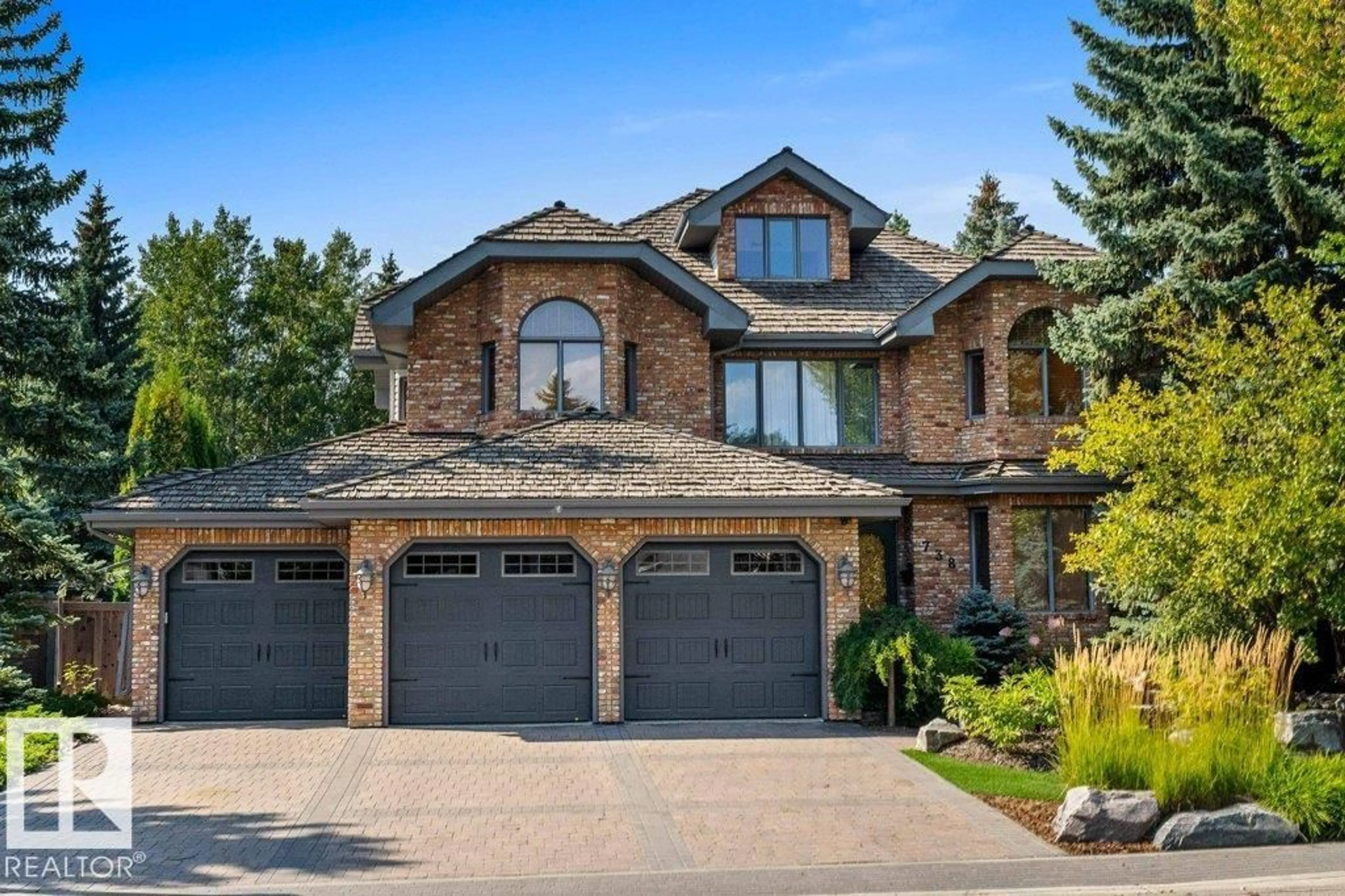Home with brick exterior material, street for 738 WHEELER RD, Edmonton Alberta T6M2E8